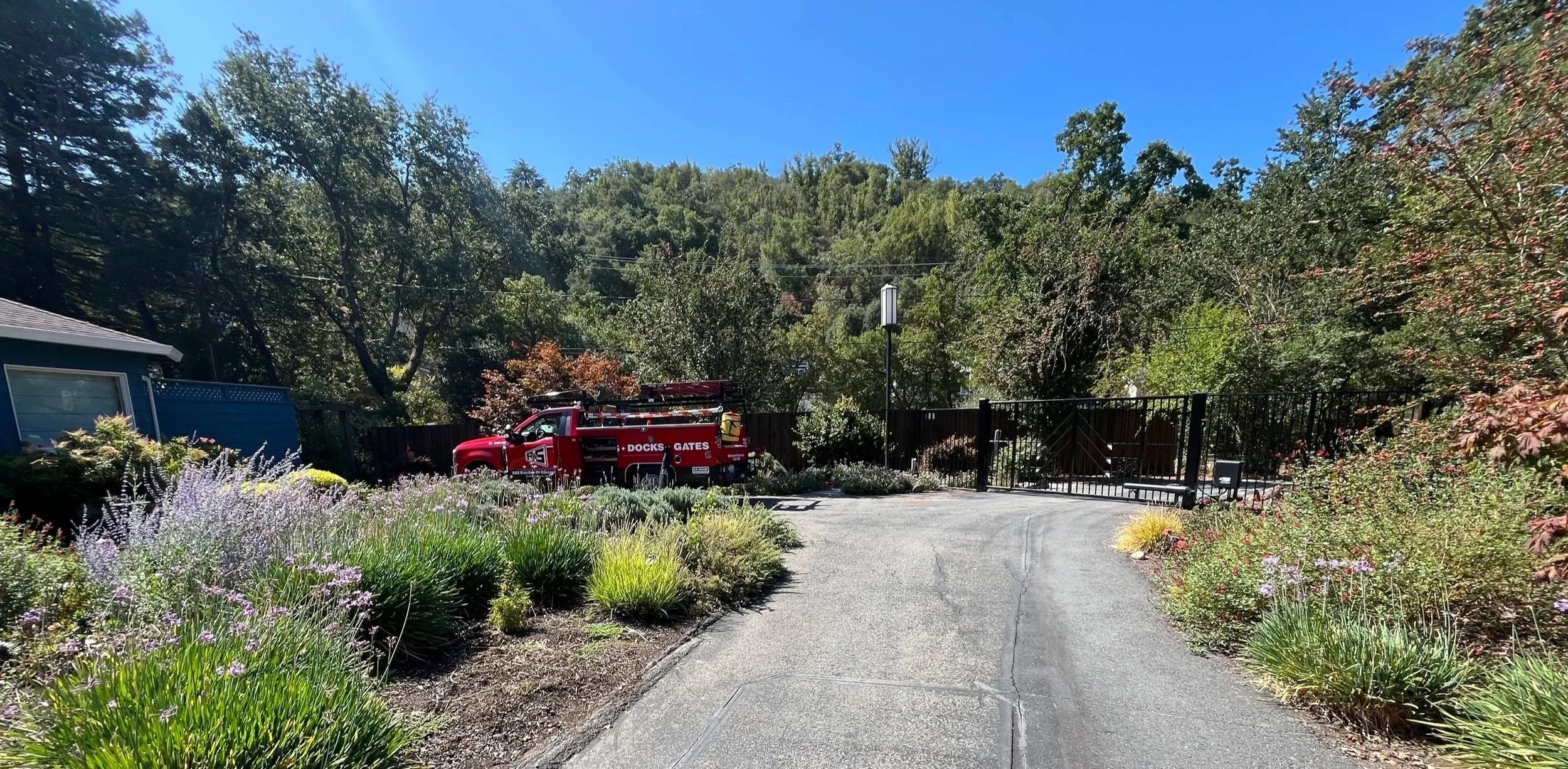 R&S Red Truck near entry gate for repairs