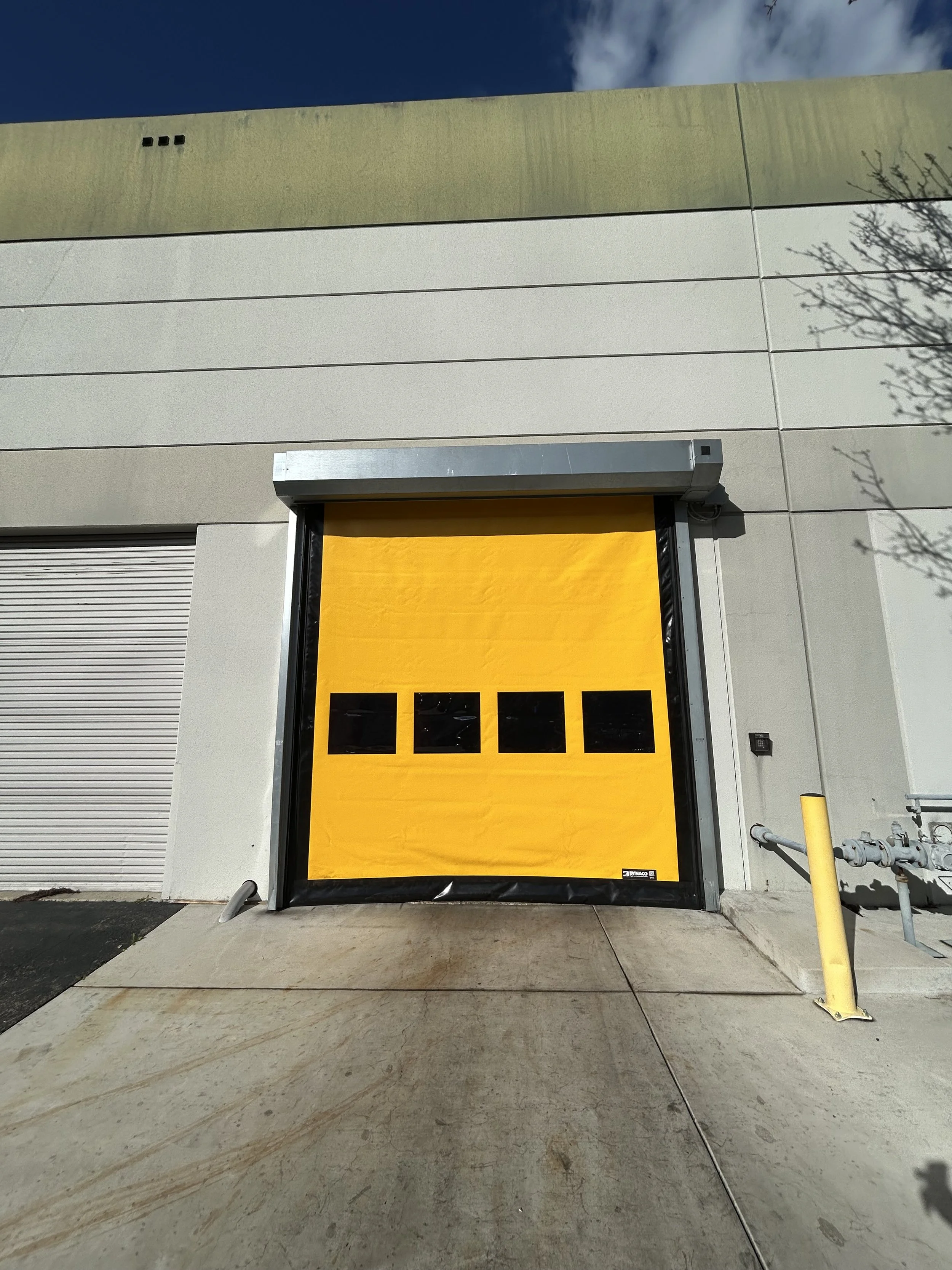 R&S Concord repaired a yellow Dynaco M2 High Speed Door
