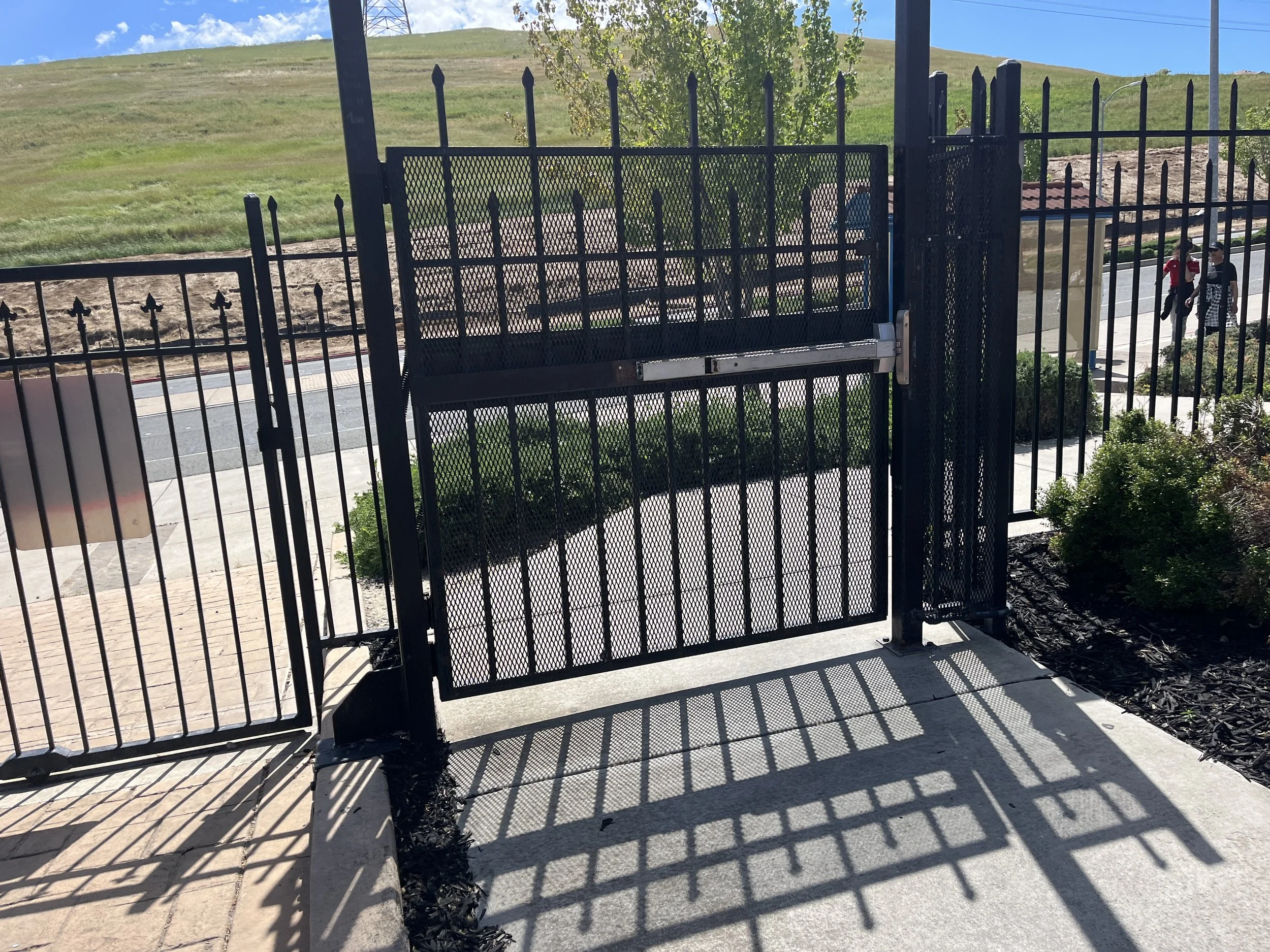 Metal pedestrian gate repaired by R&S Concord in Pittsburg, CA