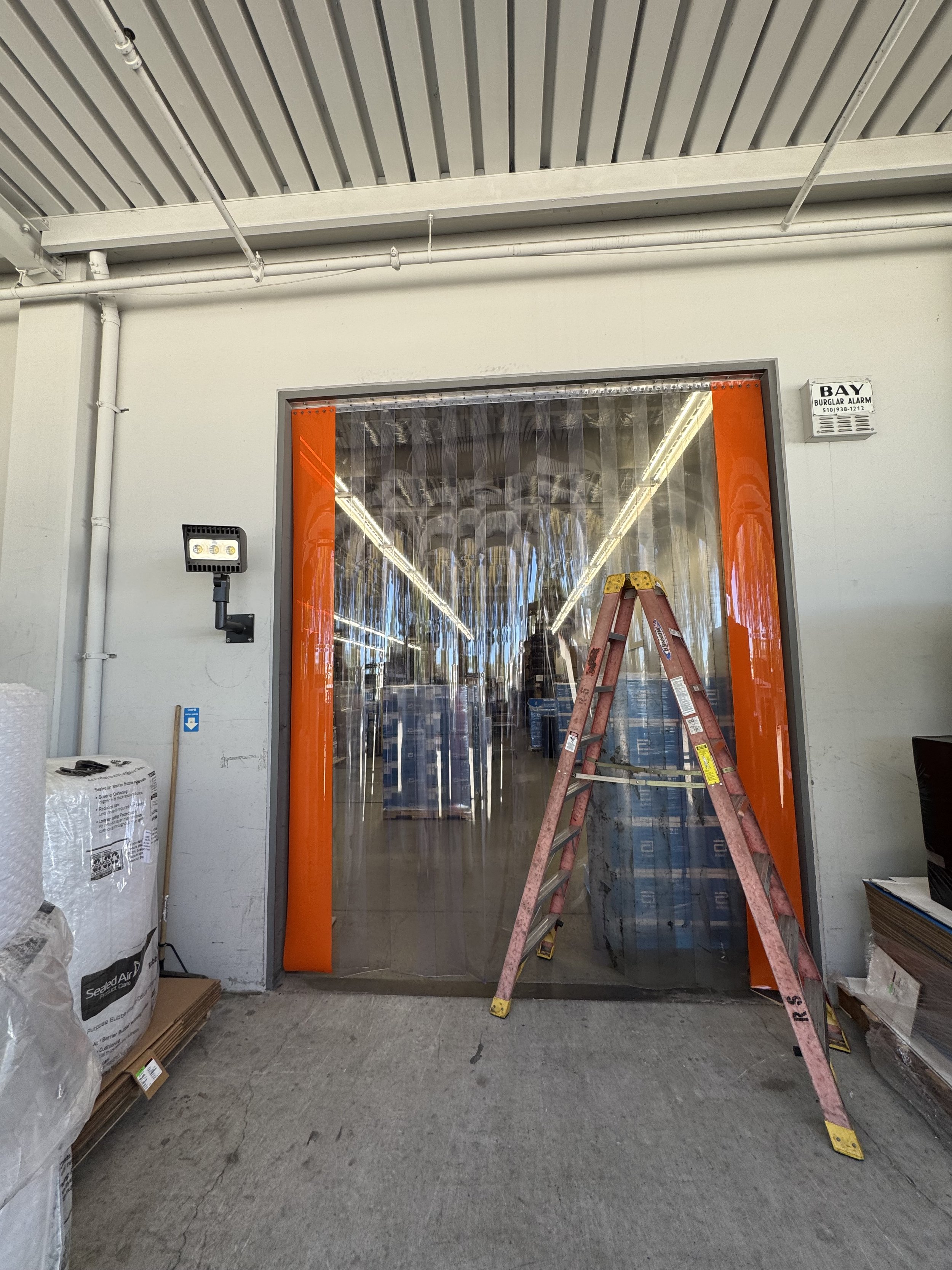 R&S Concord replaced a worn strip door