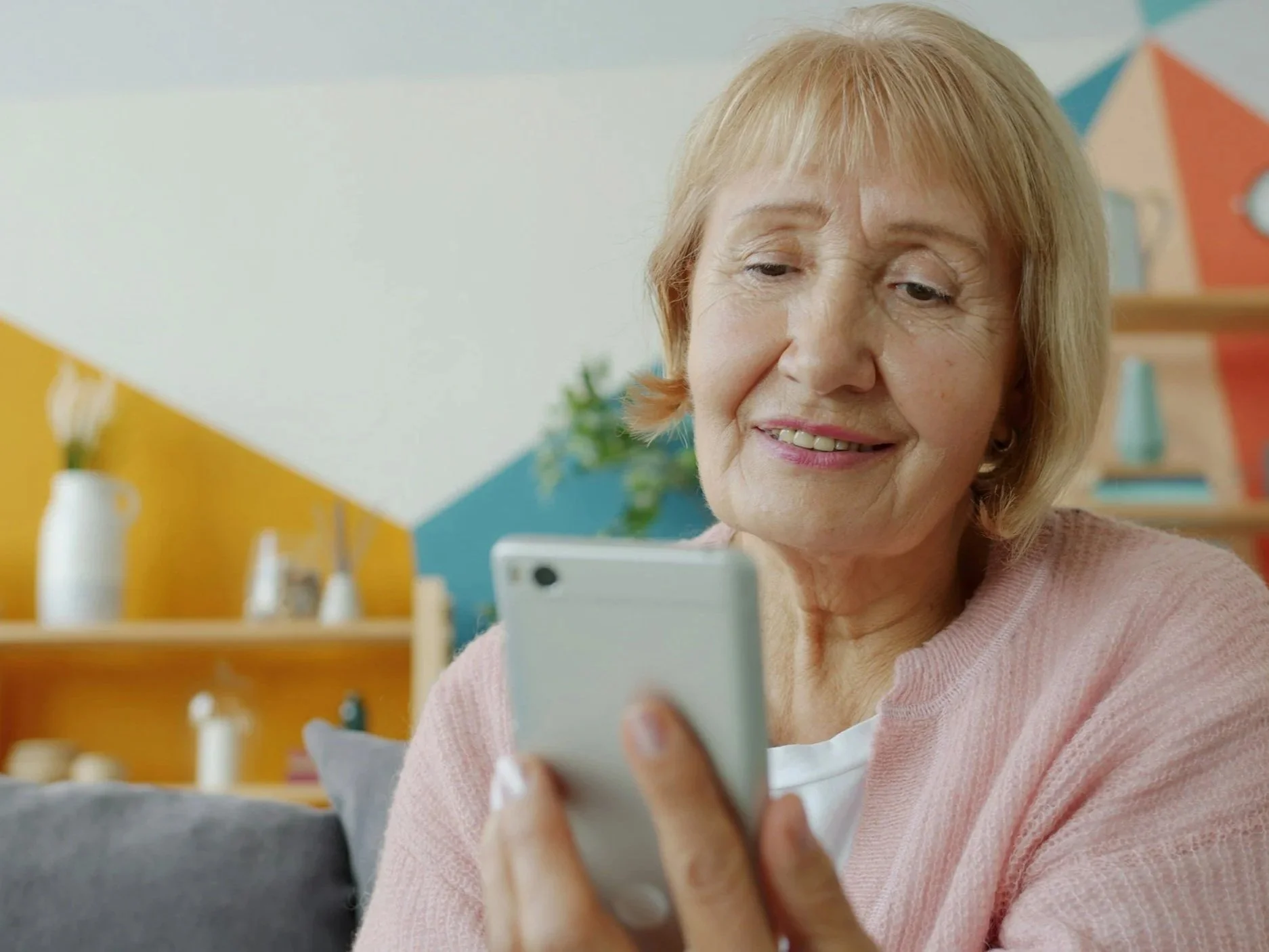 Older woman using her phone