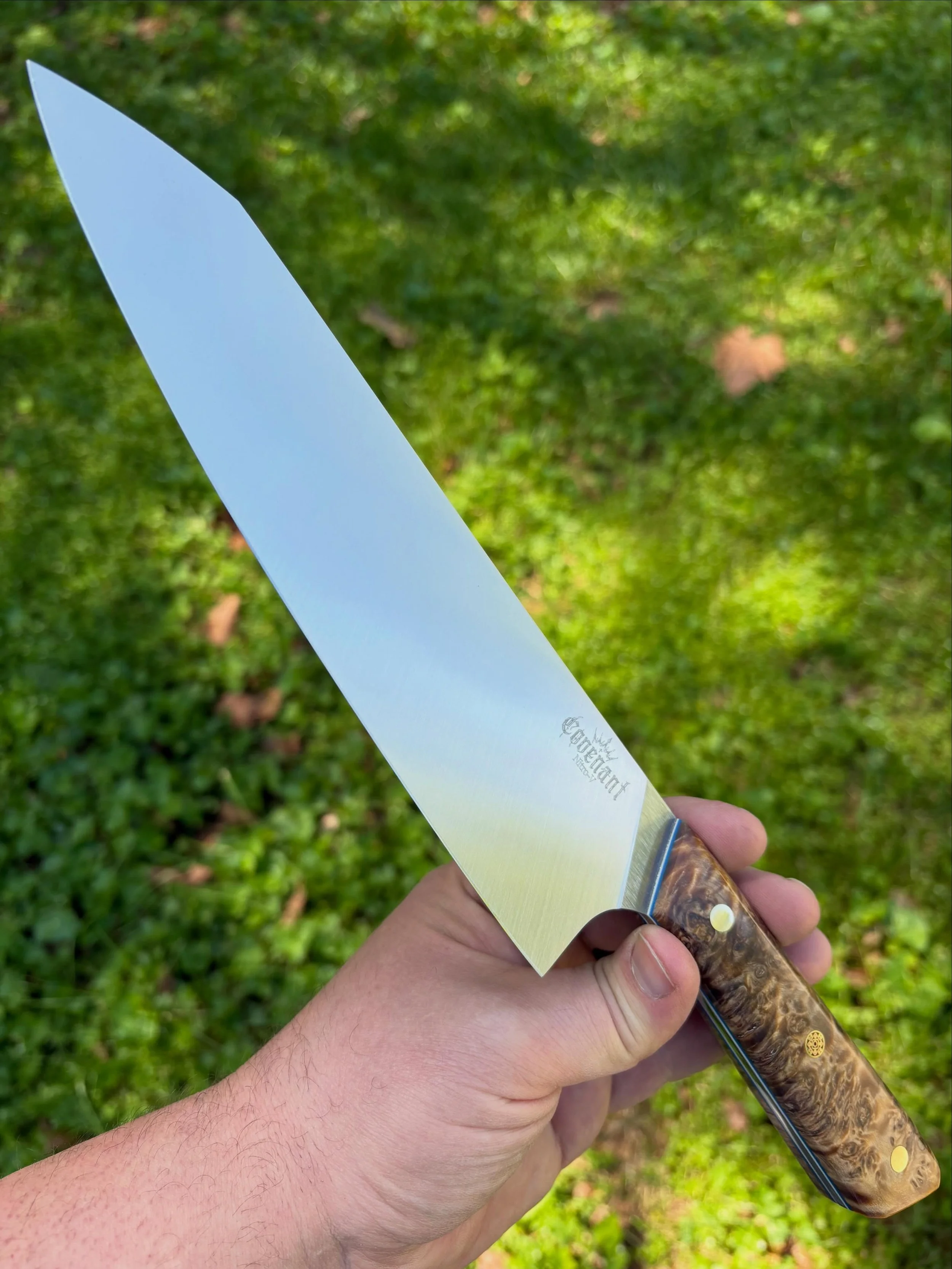 Poplar Burl with white and blue liners on this 8&rdquo; chef.