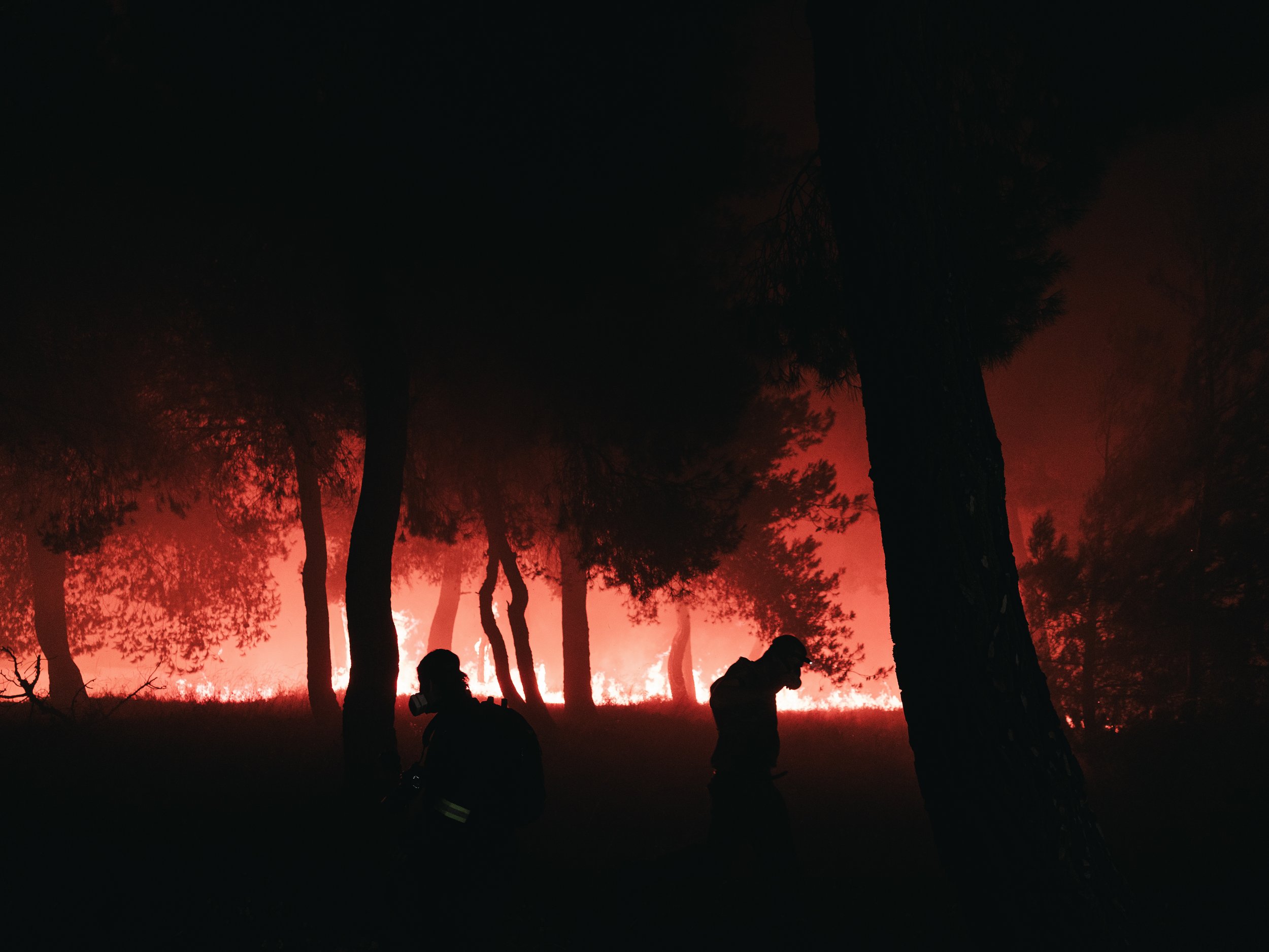 A wildfire near Asprohori rapidly spreading as emergency crews are working to contain the fire and protect residents in northeastern Attica in Asprohori on July 9, 2025.