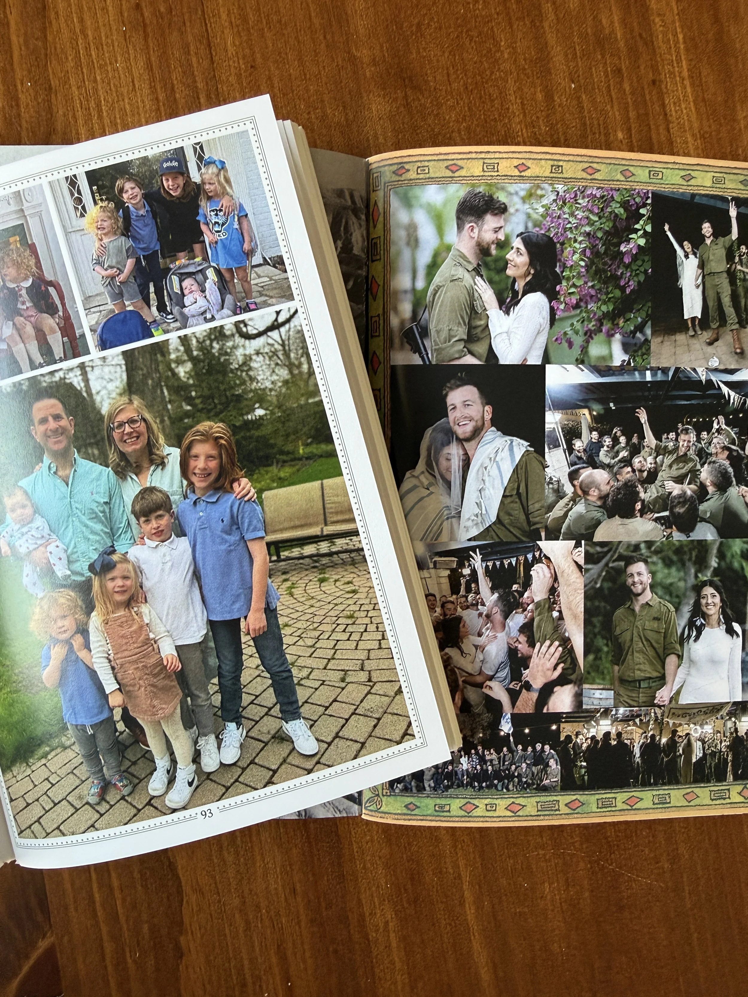 Photo album open to pictures of people at a celebration or family gathering, including groups of children and adults smiling and posing for photos in outdoor and indoor settings.