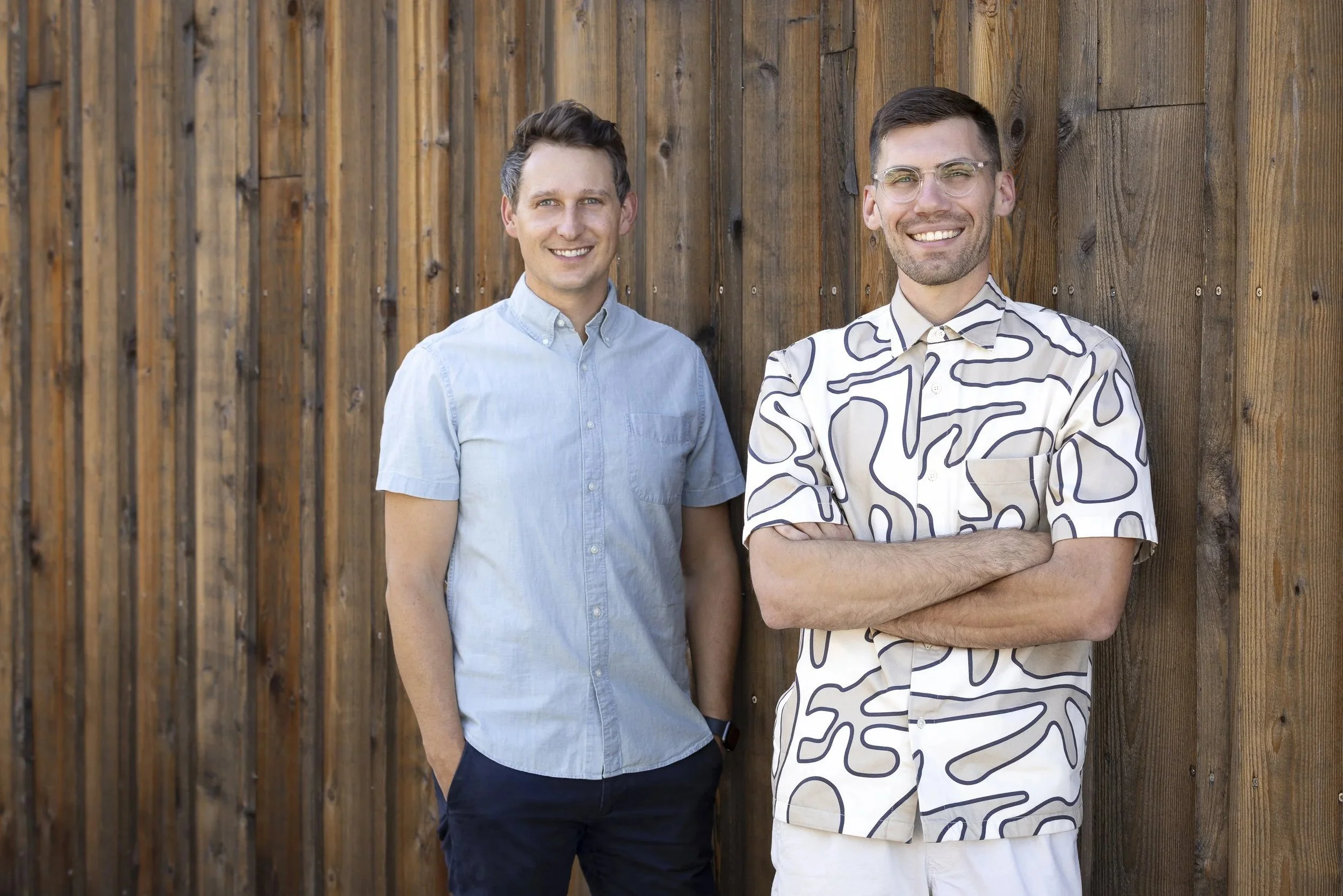 Blake Bethards and Joe Tracy, co-founders of Pacific Northwest architecture firm Field Report, standing outdoors.