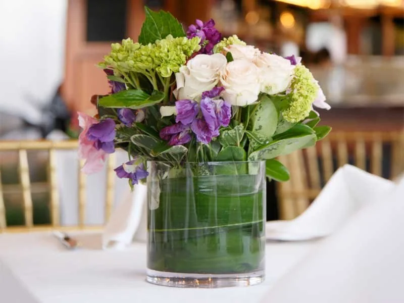 Flower bouquet on a table for a yacht memorial service