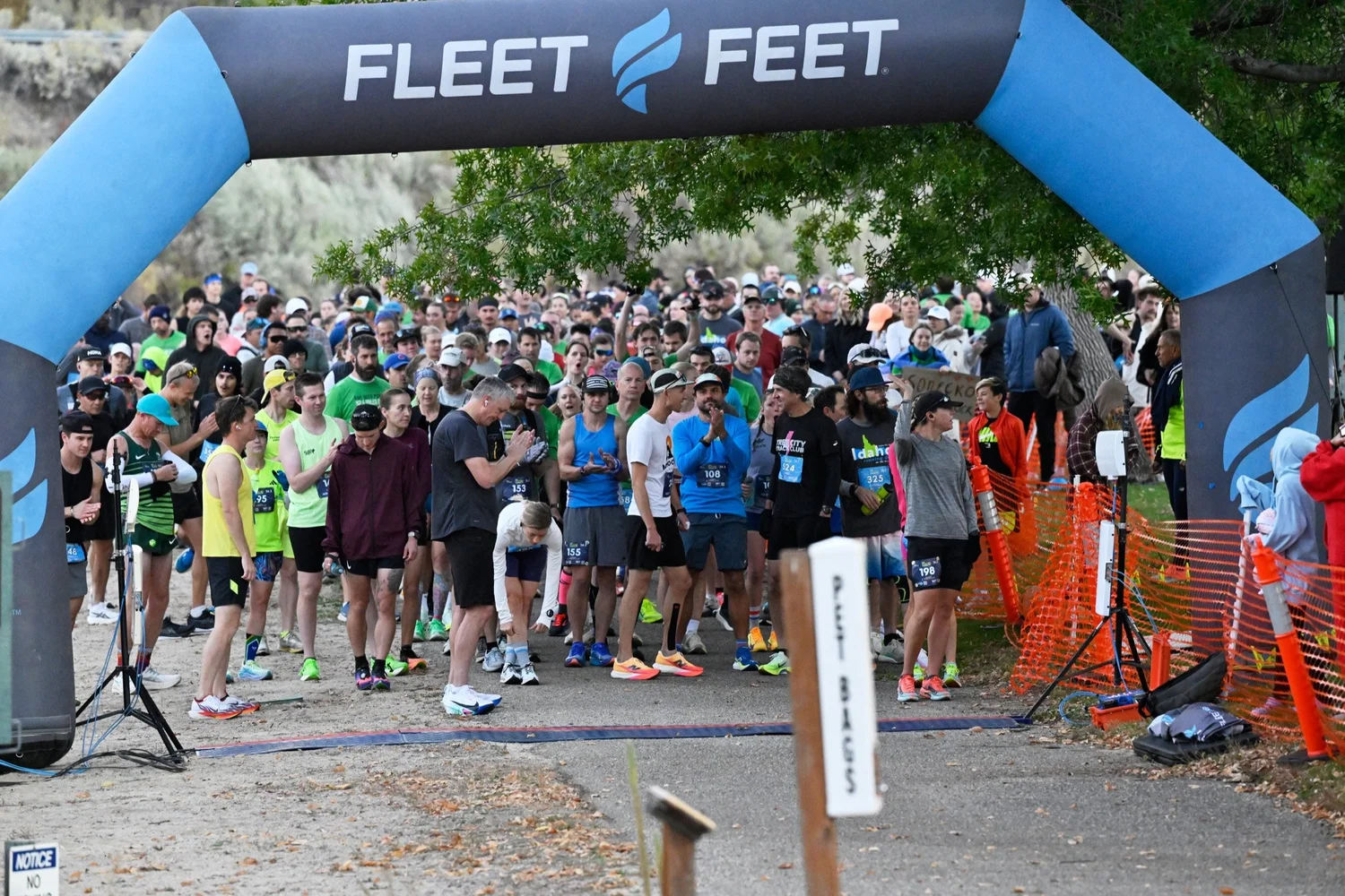 Hundreds of runners at the Idaho Running Day start arch at Sandy Point