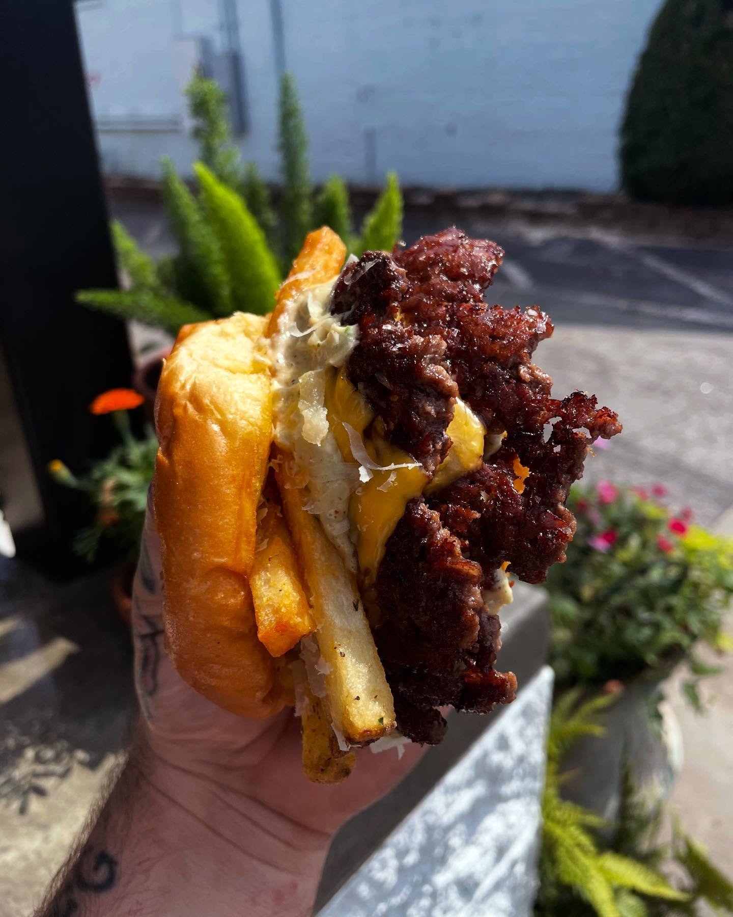 ITS NATIONAL HAMBURGER DAY!!!! WE LOVE HAMBURGERS. MMMMM STEAMED HAMS. 
.
.
This beauty here is a lil sneak peak of our special collab burger for next month with @atlgirlgang GIRL DINNER BURGER. Available all JUNE long.