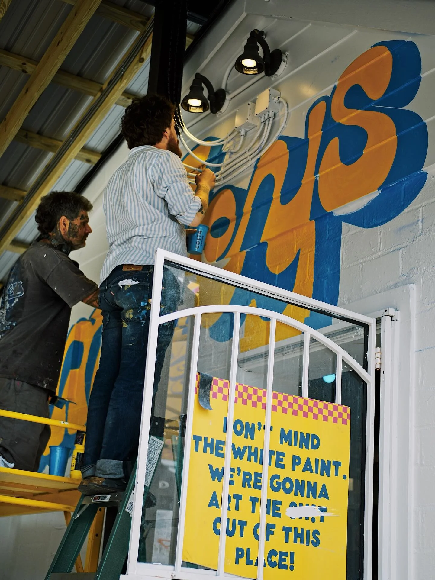 THROWBACK TO LIGHTING UP THE SPOT! Huge thanks to everyone who made it happen, especially our talented sign painters!