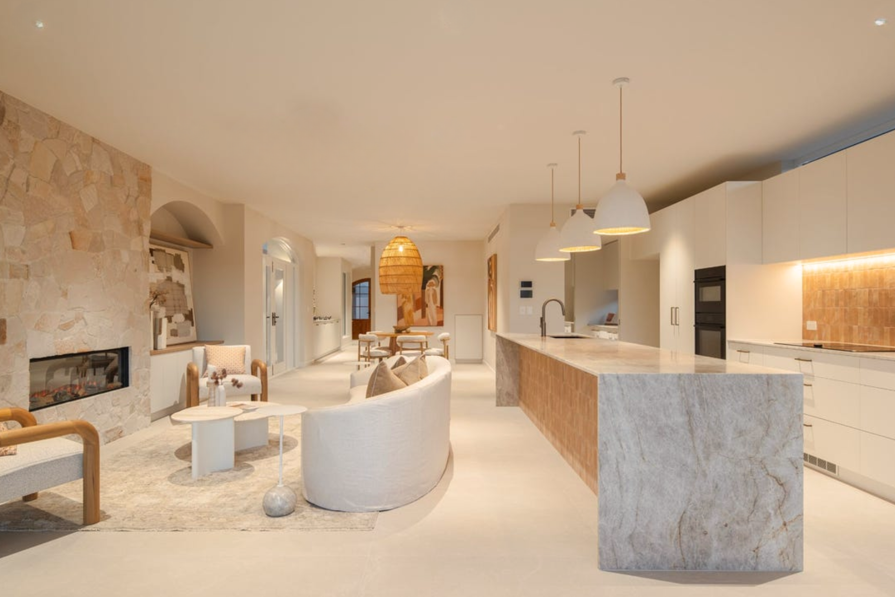 Warm coastal styling open plan living.png