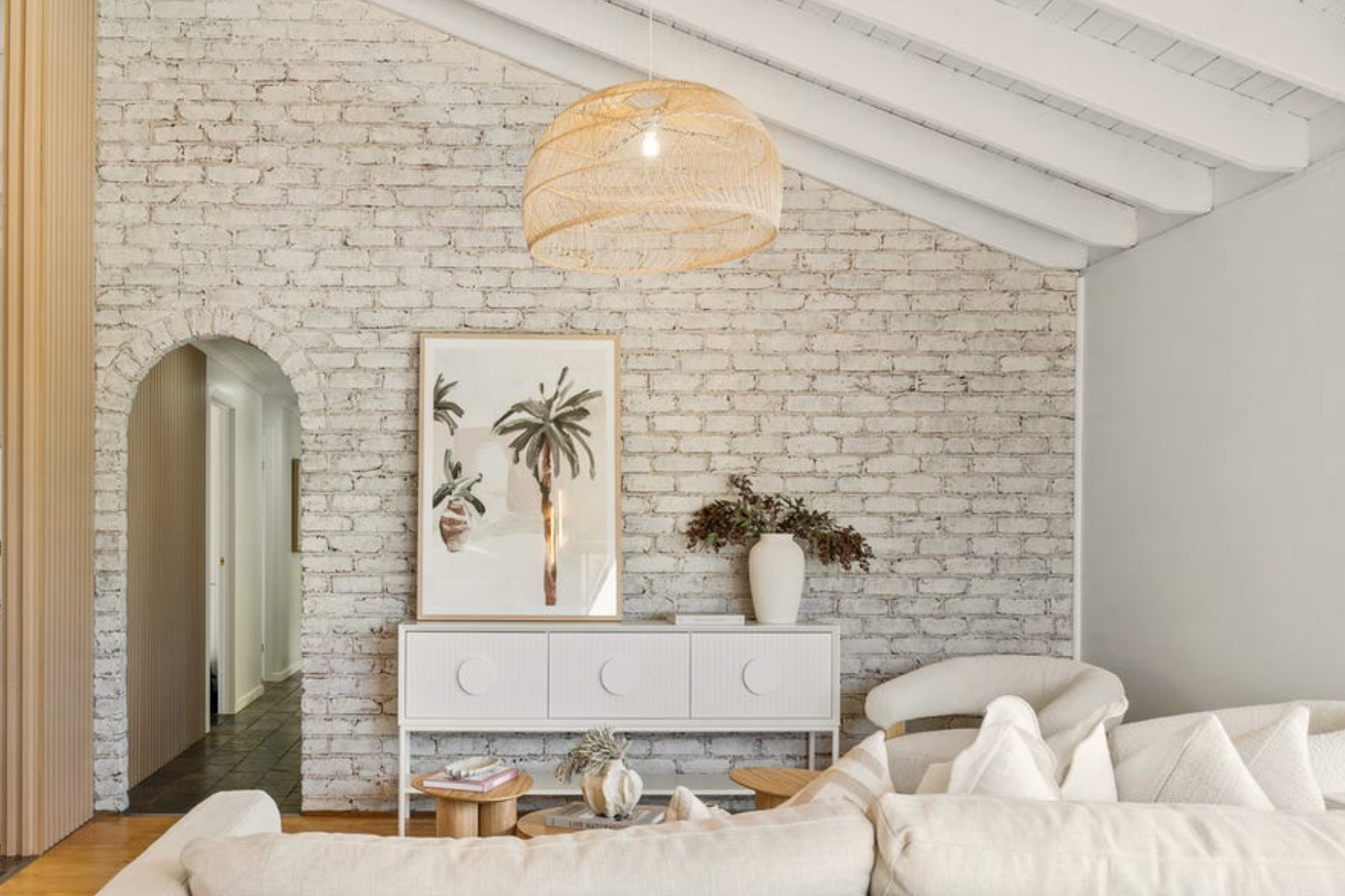 Coastal living room with arch frame.png