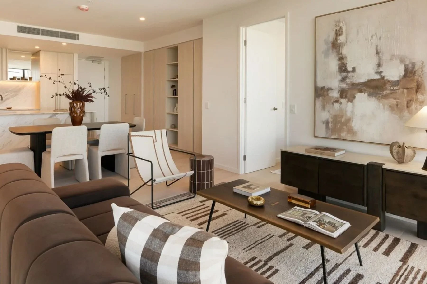 warm walnut apartment living gold coast by paradise interiors .jpg