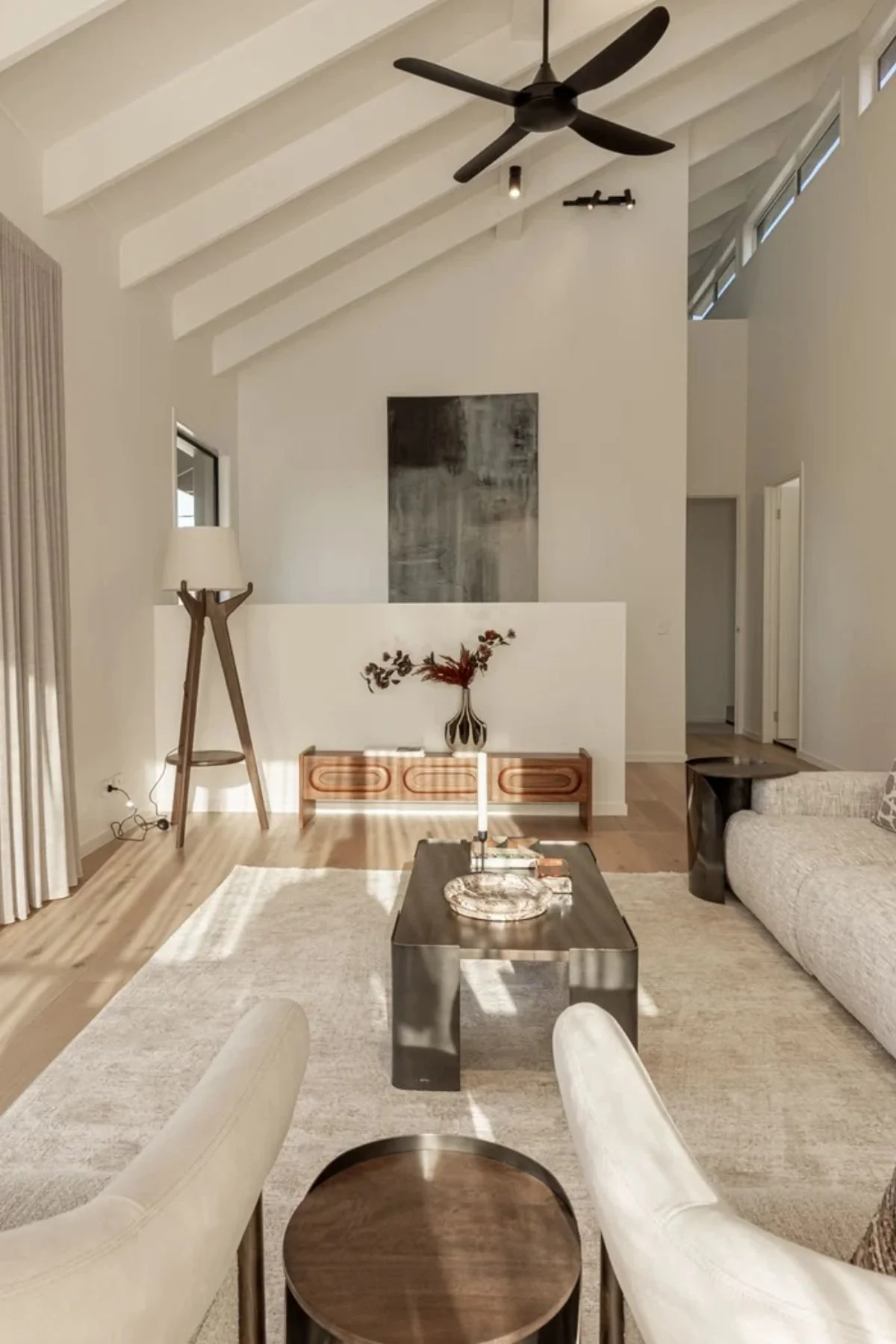 Modern walnut inspired living room by paradise interiors.jpg