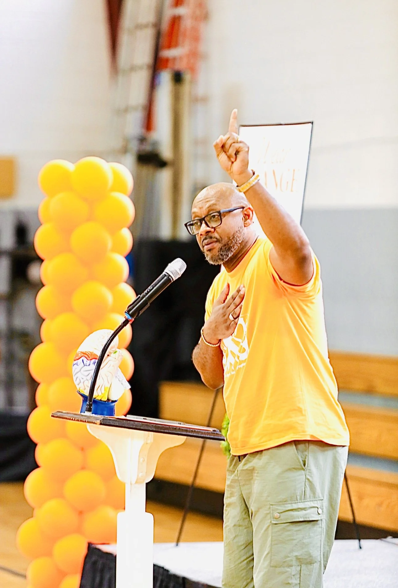 More heart, more heart, more heart. High Vibrations to everyone in the room during the Wear Orange event.