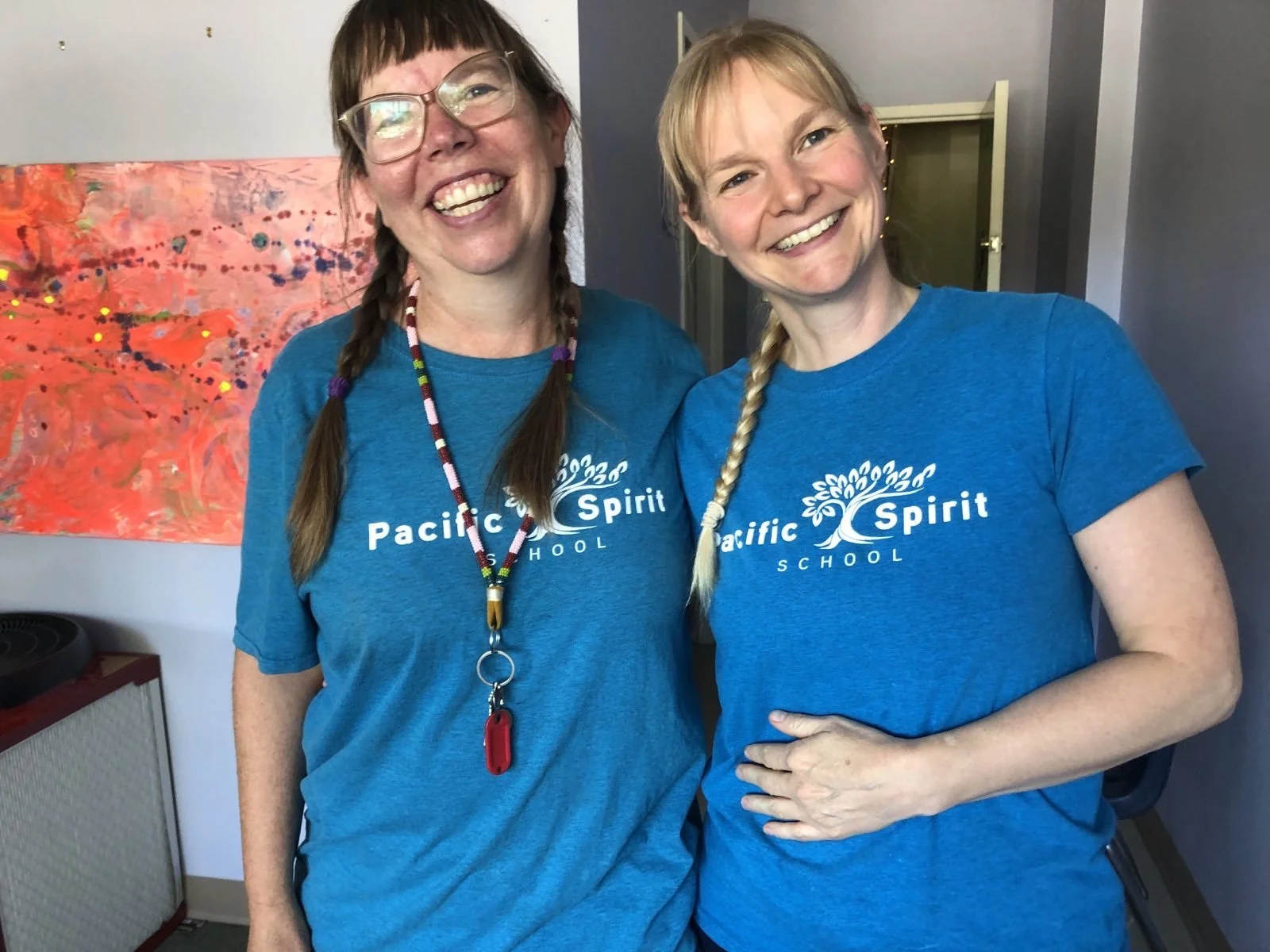 two staff members together