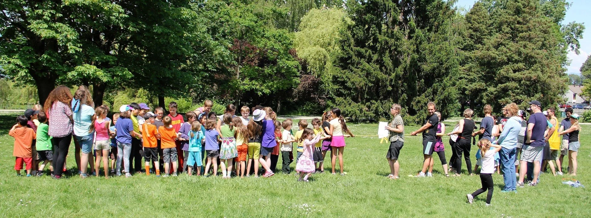A game of tug of war in a park