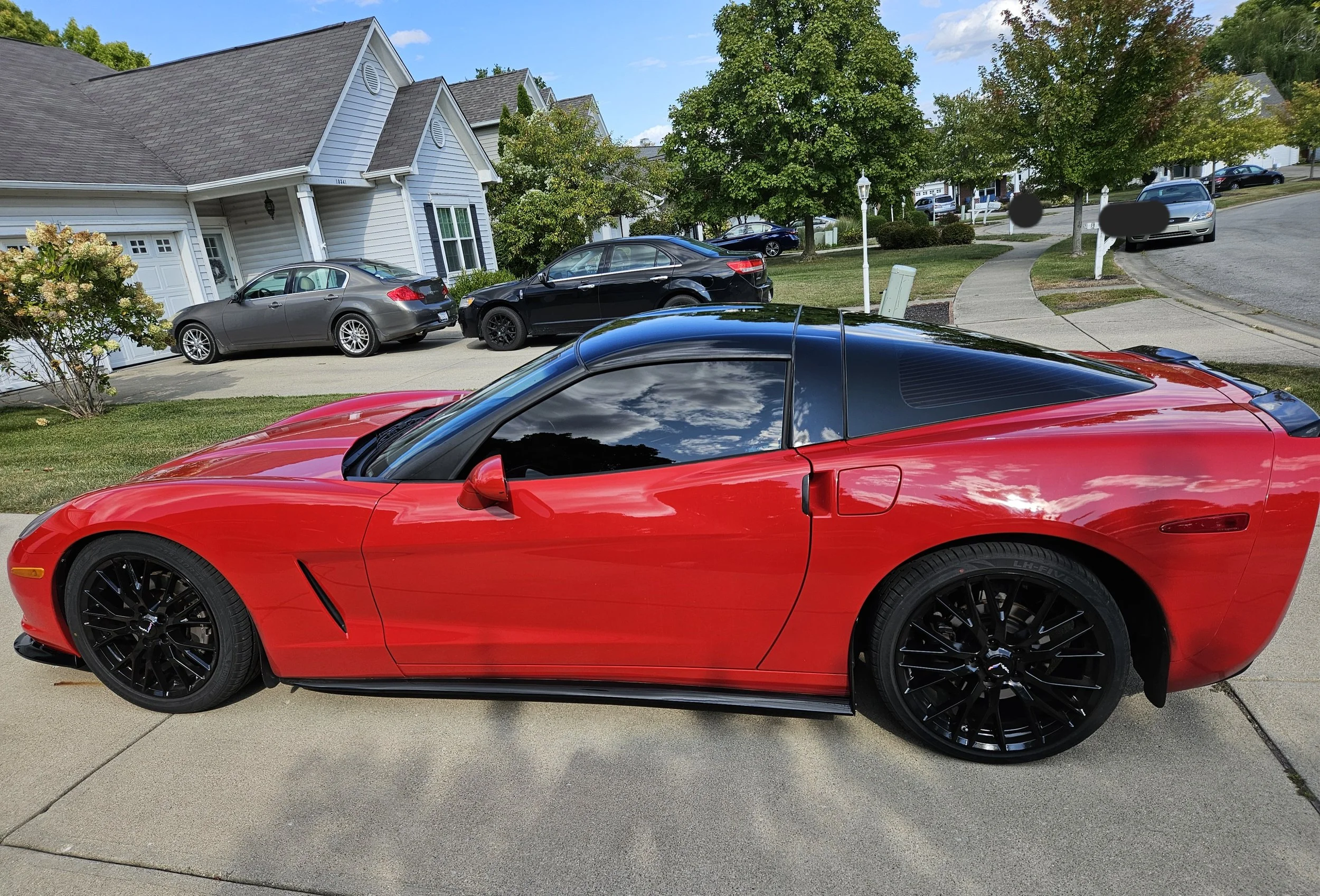 RED CHEVY CORVETTE - STANDARD TINT, ONE PIECE BACK WINDOW (HIGH LEVEL OF DIFFICULTY), BLACK VINYL WRAP ON ROOF