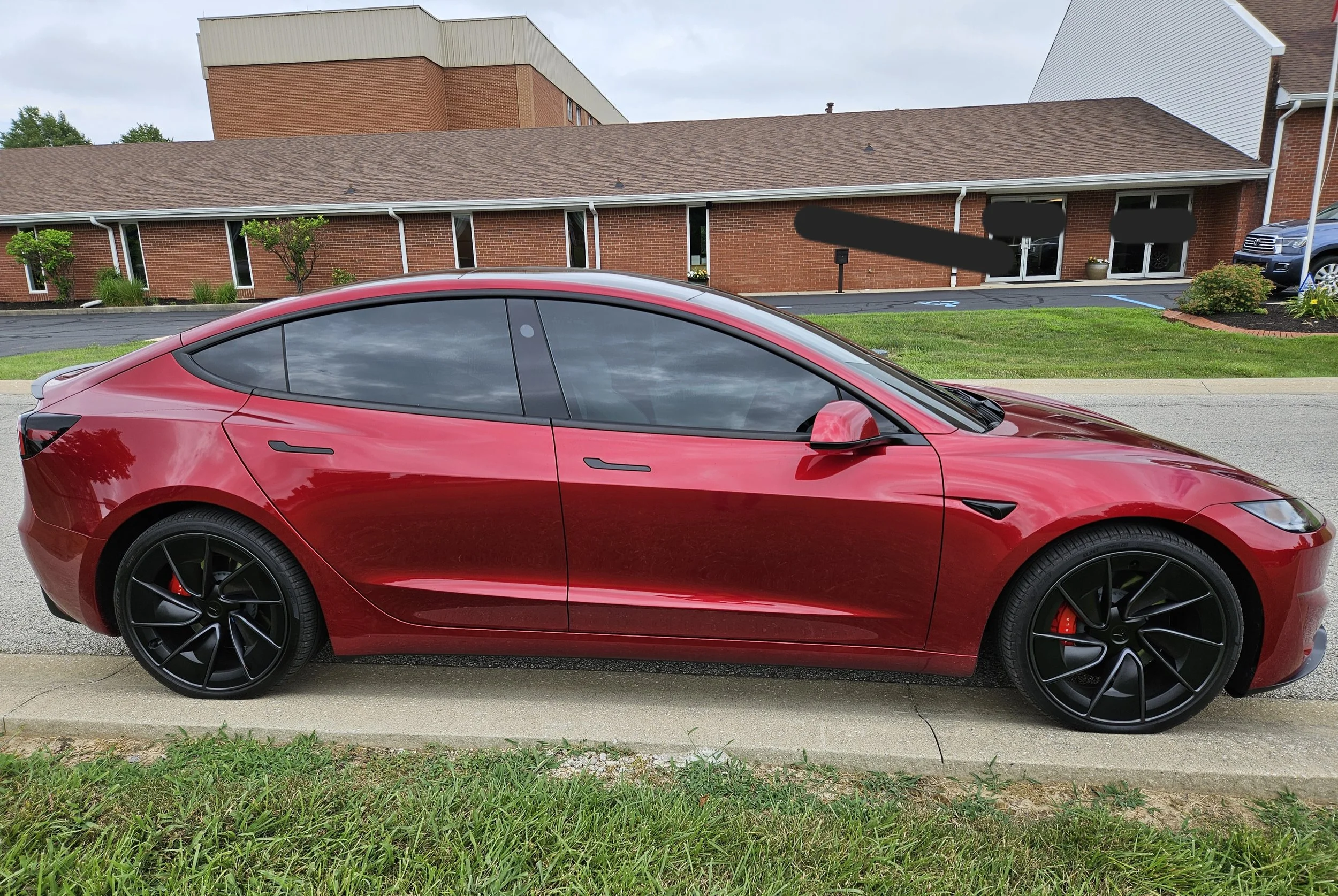 RED TESLA MODEL 3 - ULTRA CERAMIC TINT, FULL WINDSHIELD TINT, ONE PIECE BACK WINDOW TINT (HIGH DEGREE OF DIFFICULTY)