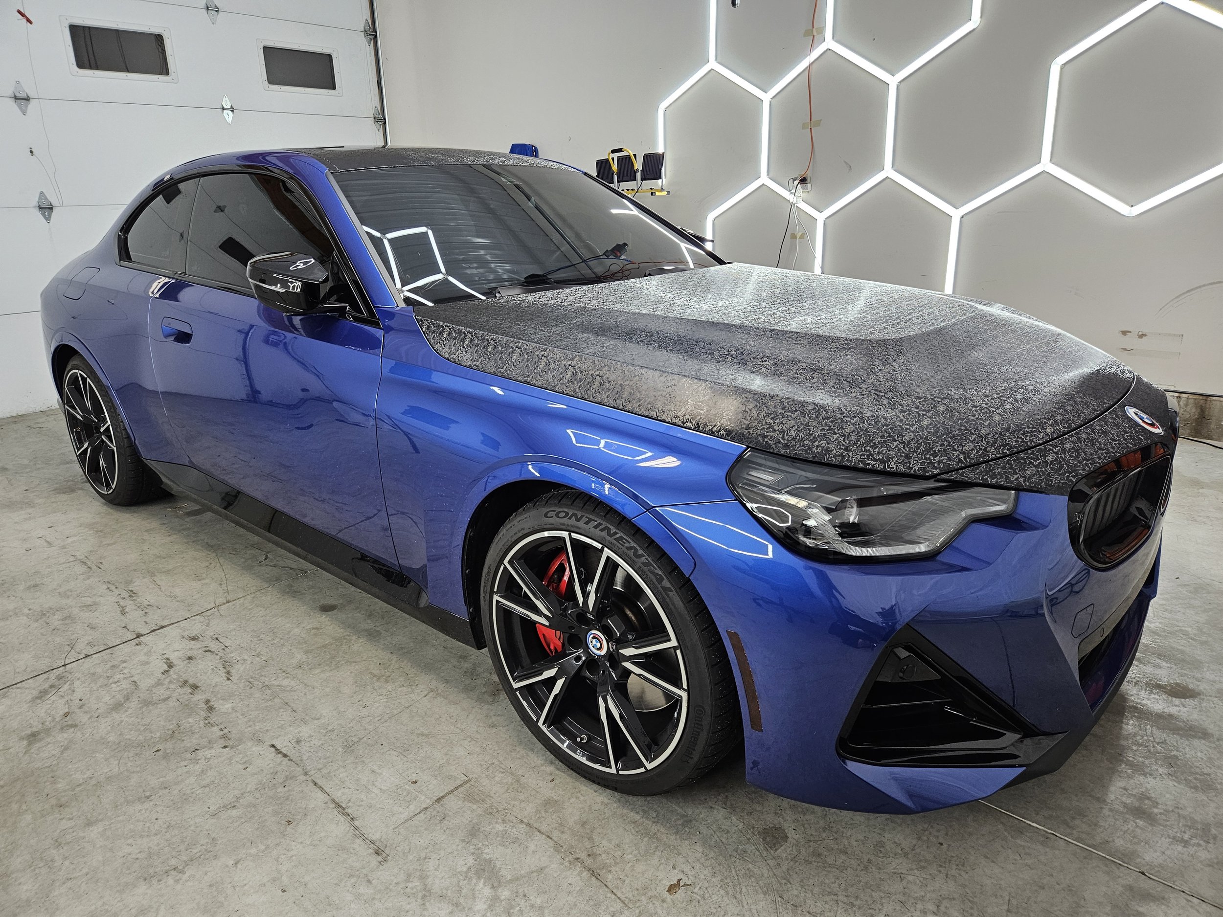BLUE BMW M240I - CERAMIC TINT, FULL WINDSHIELD TINT AND SUNROOF, BLACK DAMASCUS VINYL WRAP