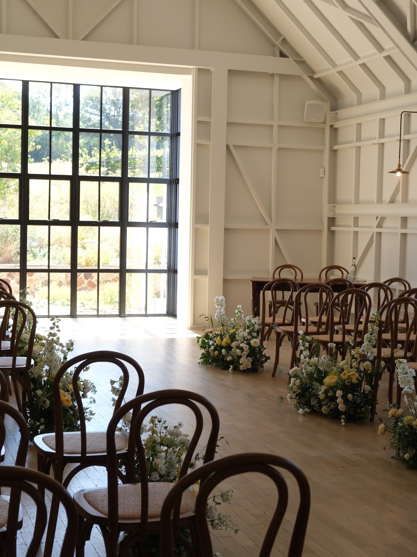 A meadow moment at Limekiln 🌼

Libby and Louis&rsquo; ceremony space was lined with softly wild, yet abundant meadows, with florals in whites, creams and buttery yellows. I so loved how they looked with the interior details in this space, especially