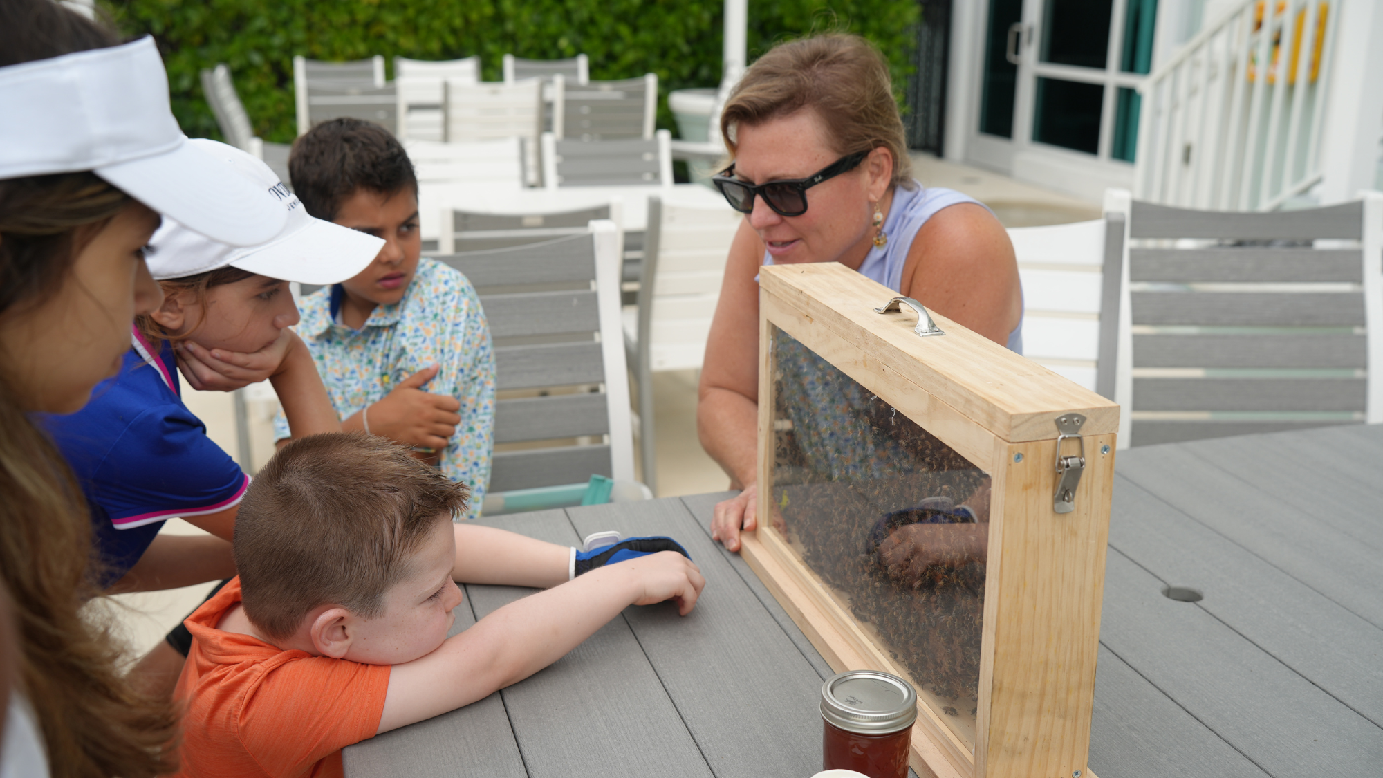 Participation Award 3rd Place: Sandhill Crane Golf Club's Volunteer with Kids Learning about Honey Bee's