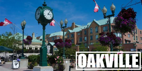 Oakville's Towne Square, featuring the iconic clock tower, a central gathering place for the community. Streaming Inc. provides live streaming and AV solutions for events in Oakville, connecting audiences near and far.