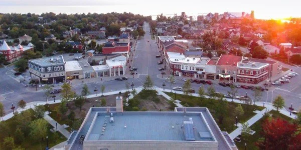 Goderich, Ontario's unique octagonal town square bathed in the warm glow of sunset. Streaming Inc. helps organizations in Goderich share the beauty of their town and the vibrancy of their events through live streaming and video production.