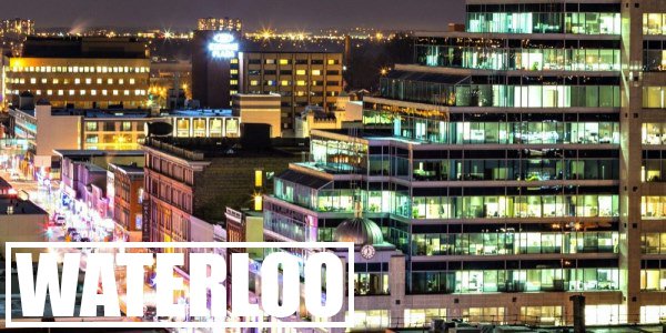 Waterloo, Ontario's vibrant downtown illuminated at night. Streaming Inc. partners with tech companies and universities in Waterloo to enhance their events with live streaming and AV support.