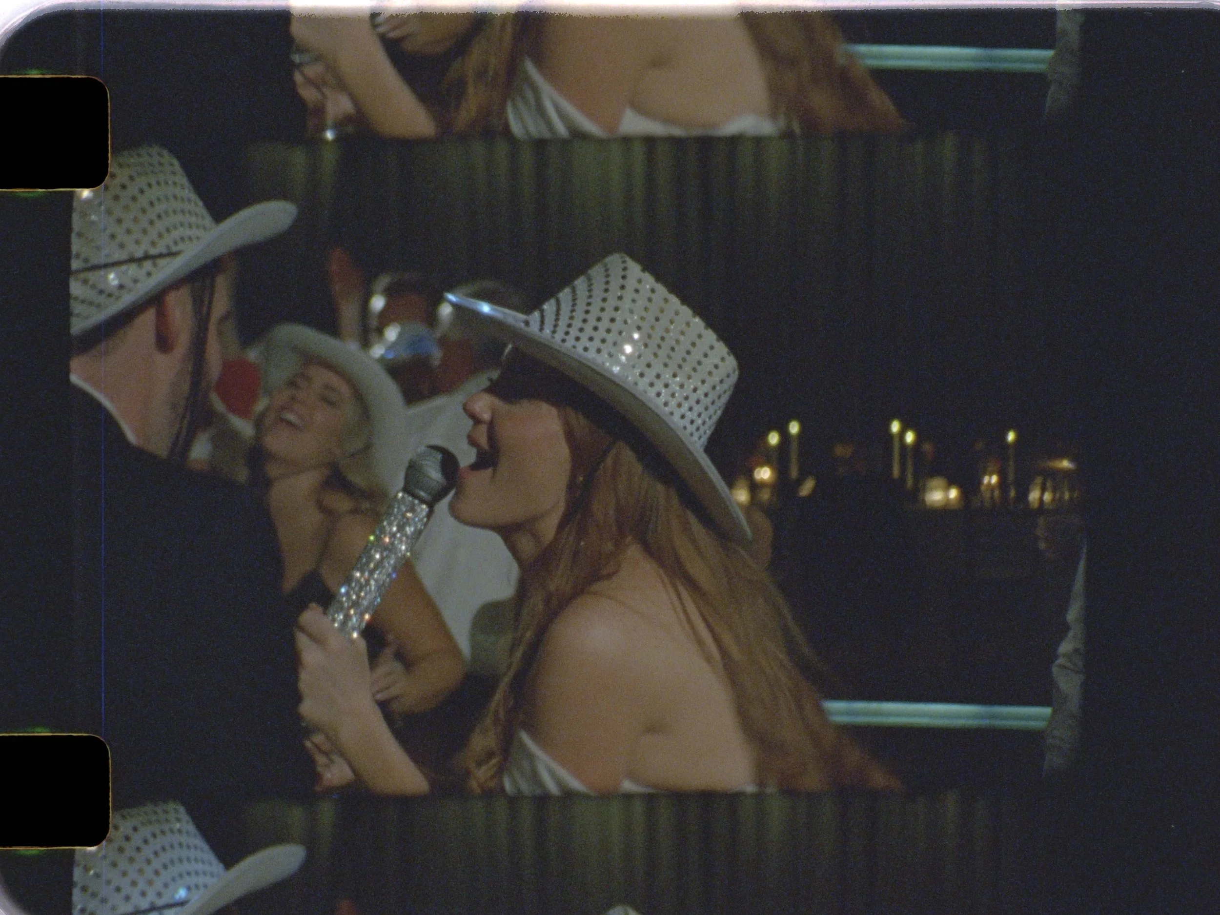16mm film frame of a bride and groom dancing on their wedding at The Astorian wedding venue in Houston texas