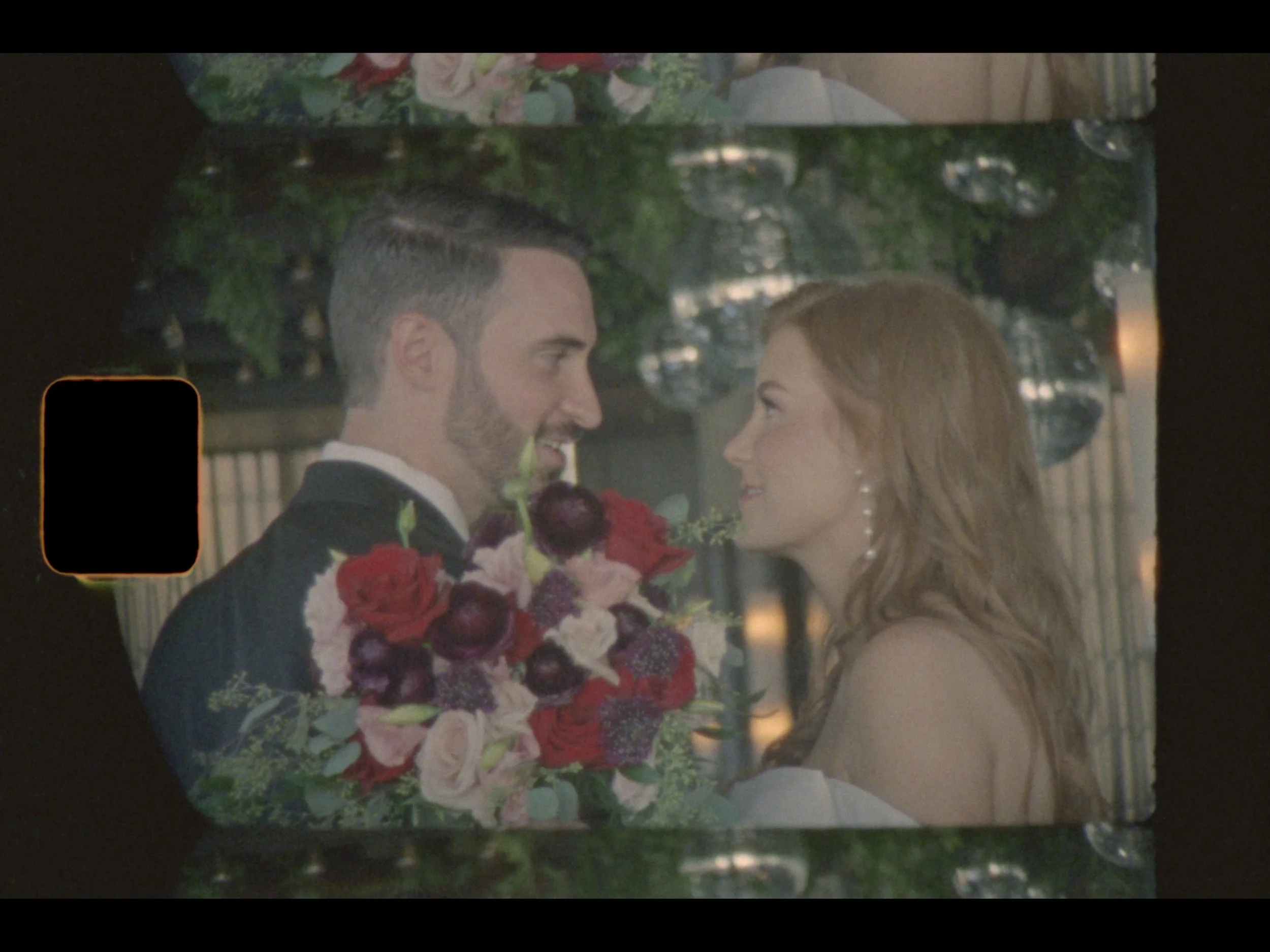 super 8 film frame of a couple getting married at the astorian wedding venue in downtown houston