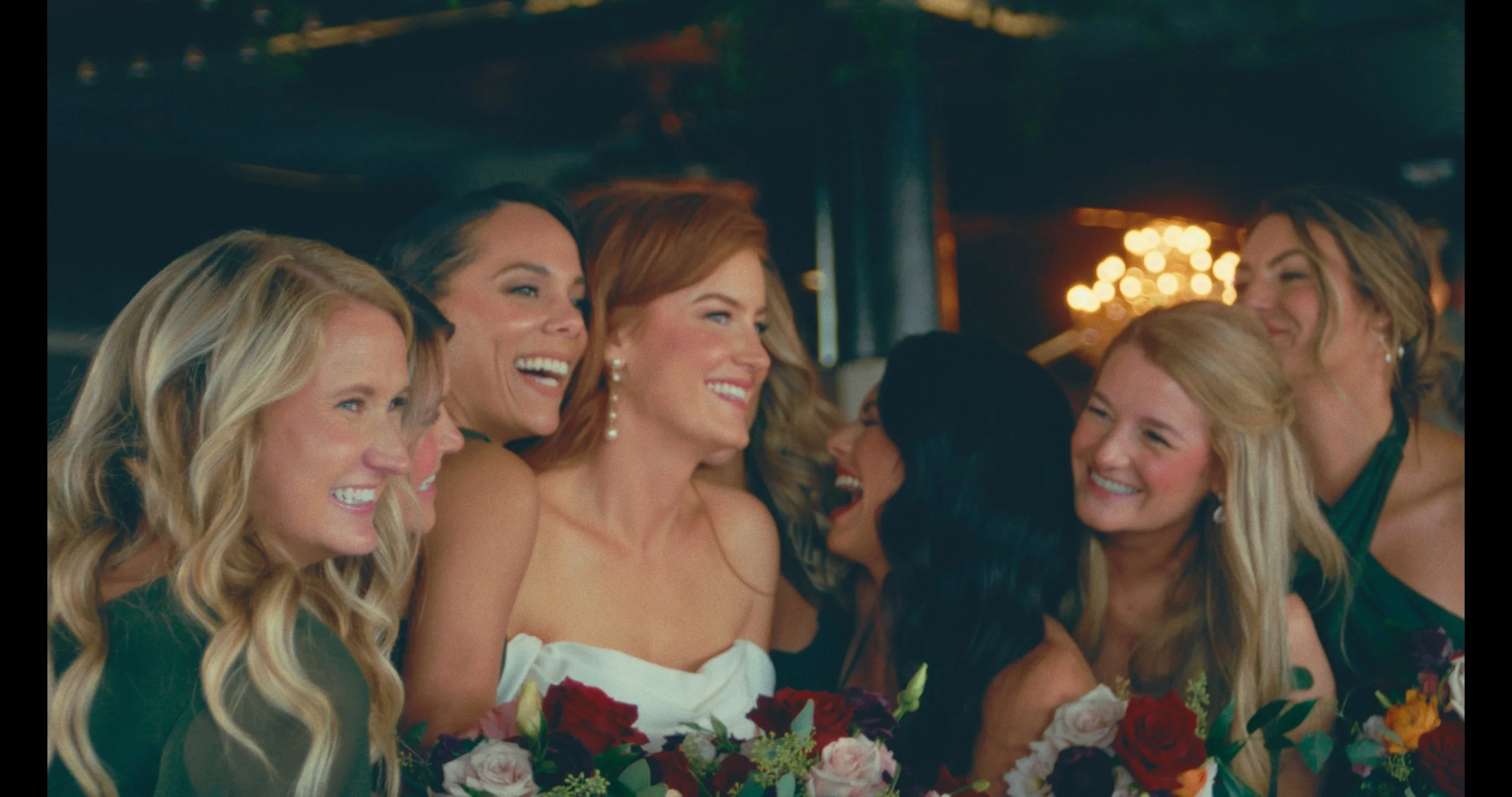 Super8 film still of a bride and her bridesmaids at the Astorian venue
