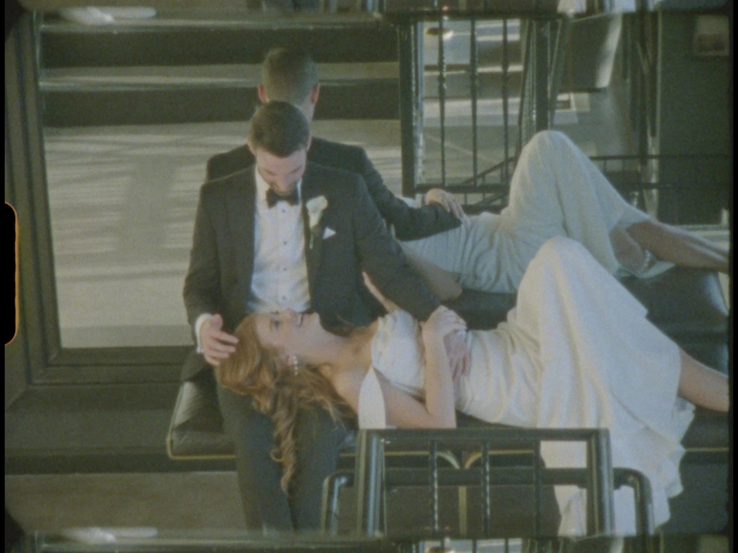 16mm film still frame of a bride and groom on their wedding day at The Astorian wedding venue in downtown Houston