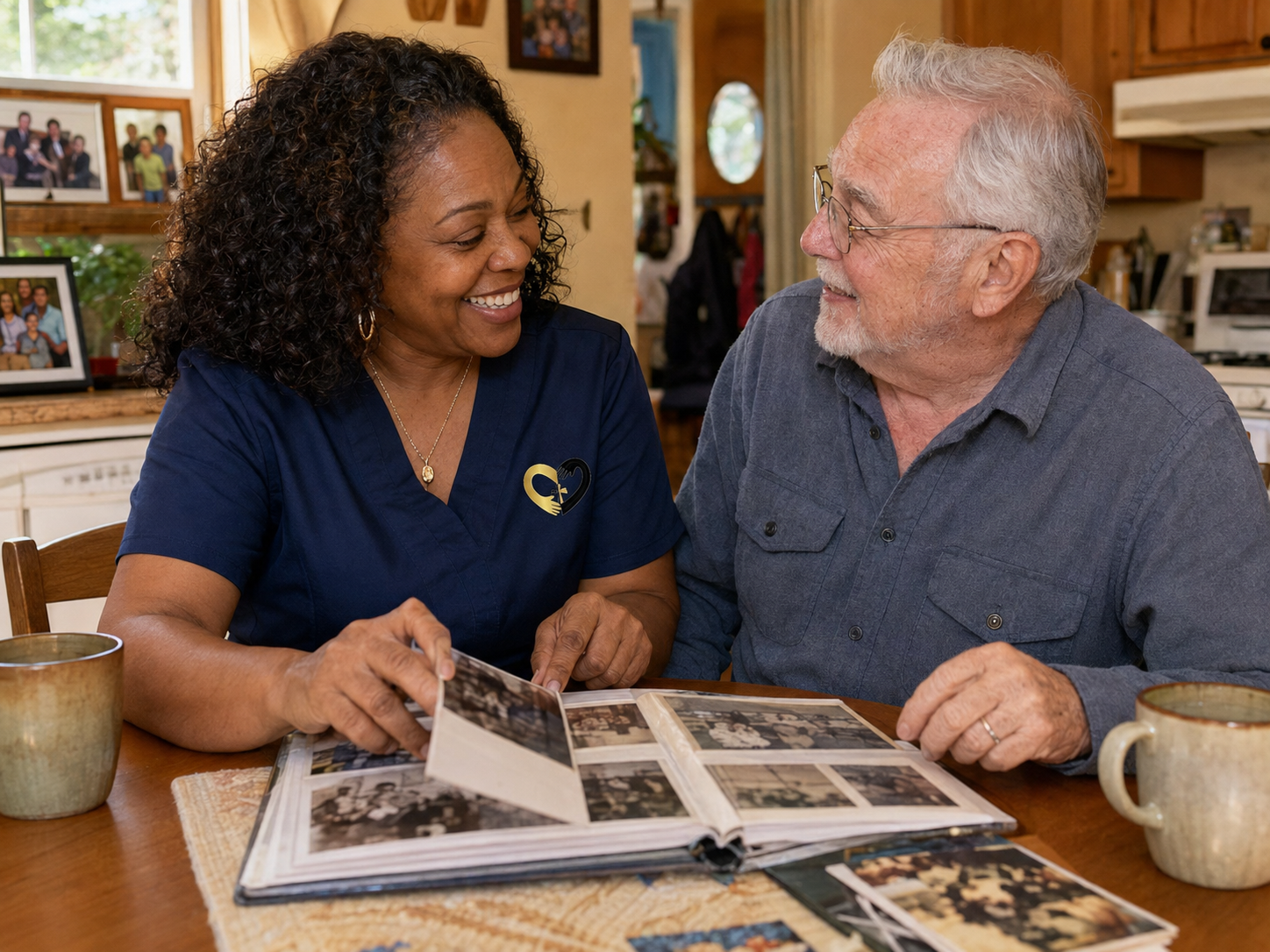 Top Notch Care companion caregiver sharing family photographs and conversation with an older adult at home.