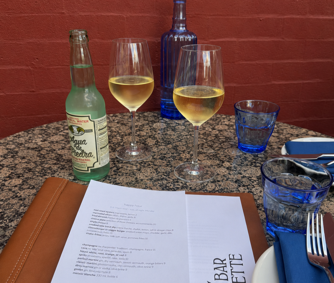 Outdoor patio dining at Bar Parisette