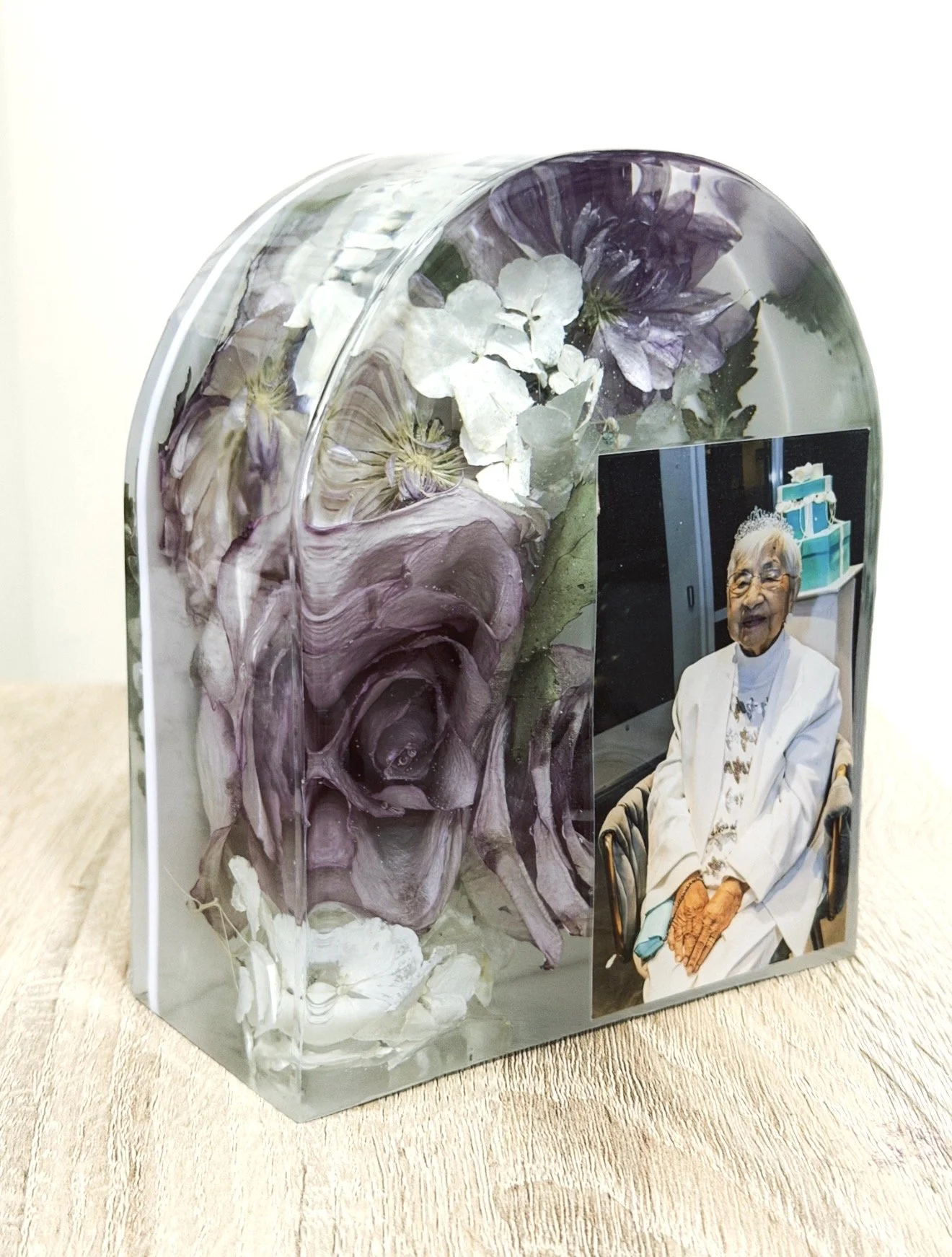 memorial flowers preserved in an arch block