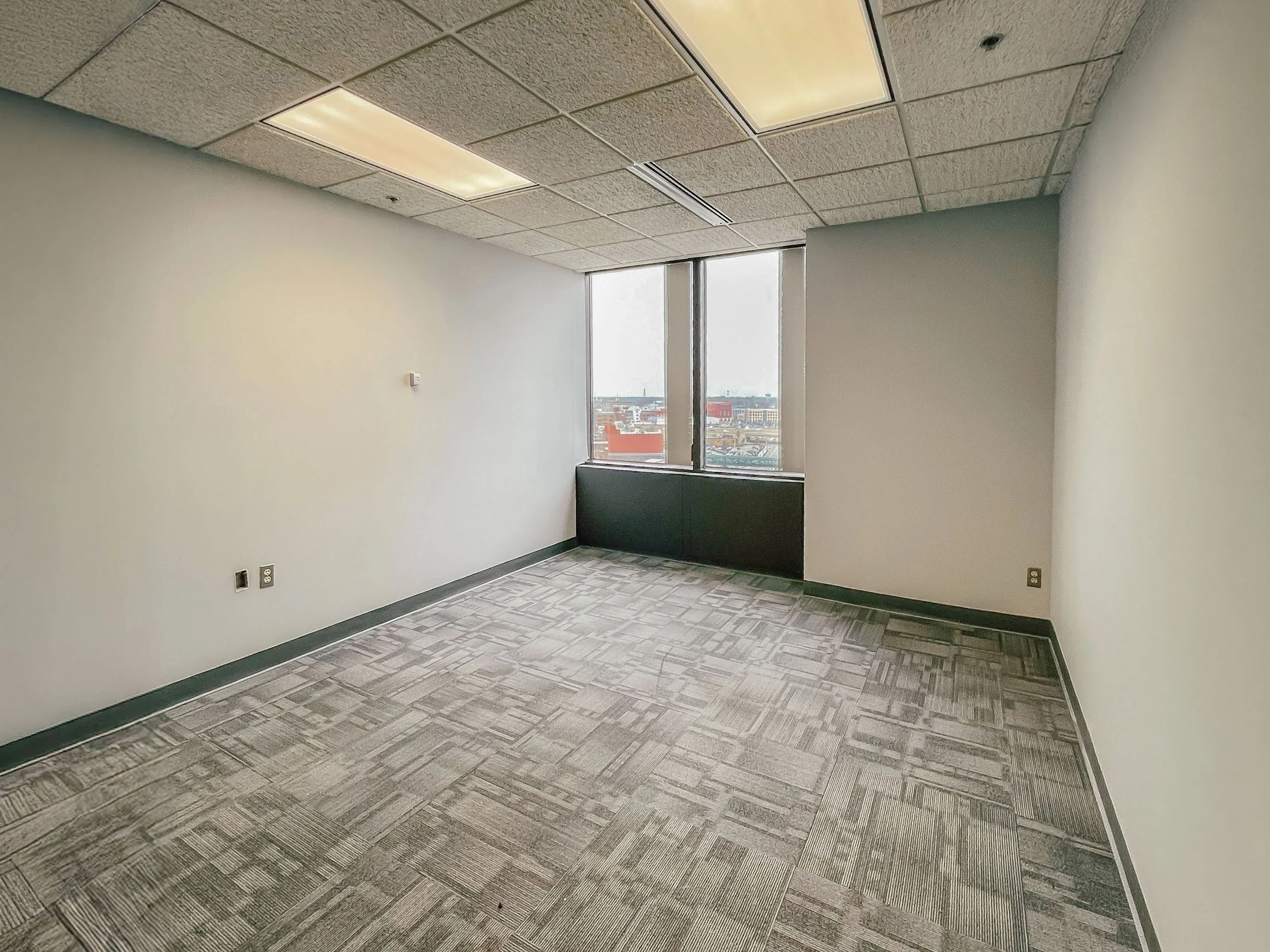 Private office in Suite 1010 at 99 Monroe with natural light