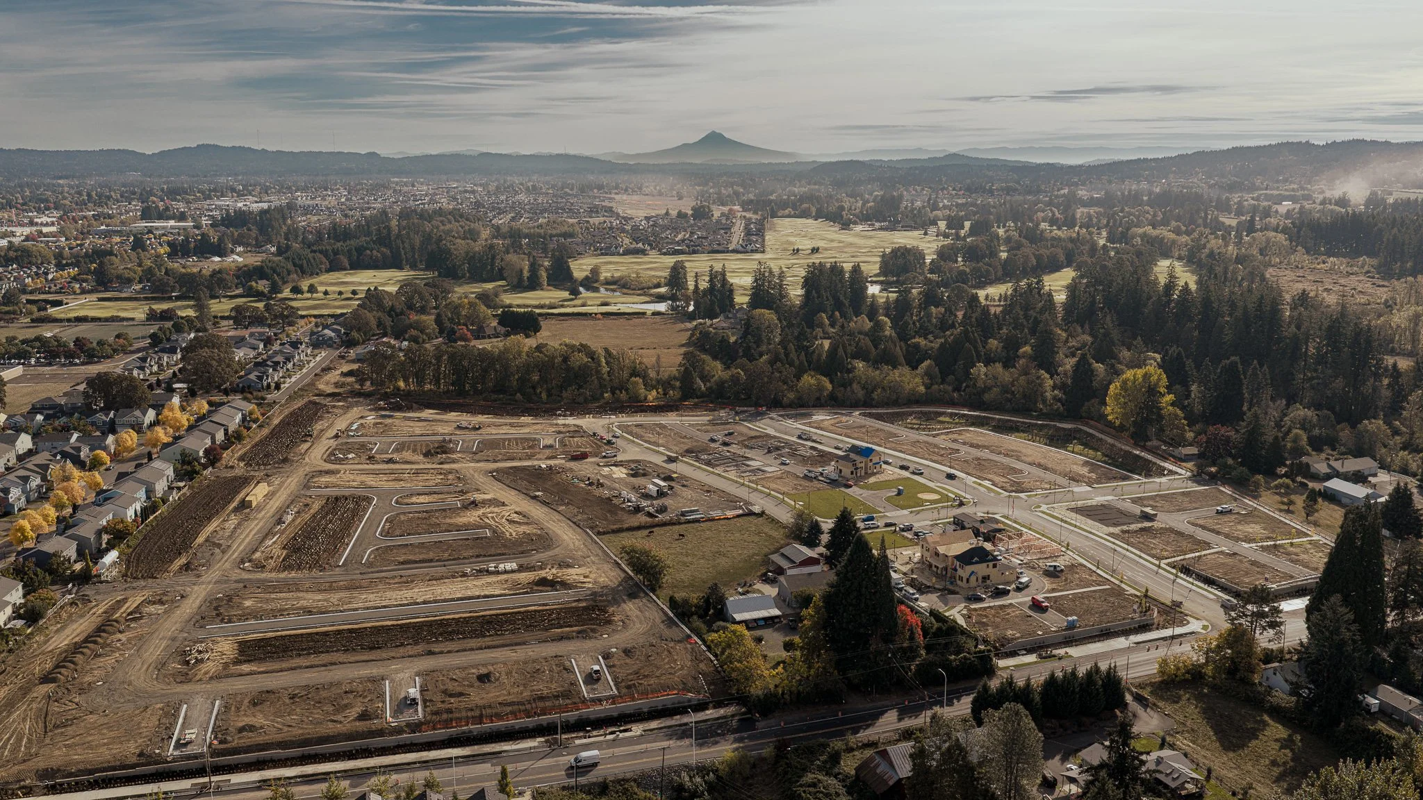An aerial view of an ongoing construction job in Portland, Oregon. A 110 unit job with houses, roads, and underground utilities installed.