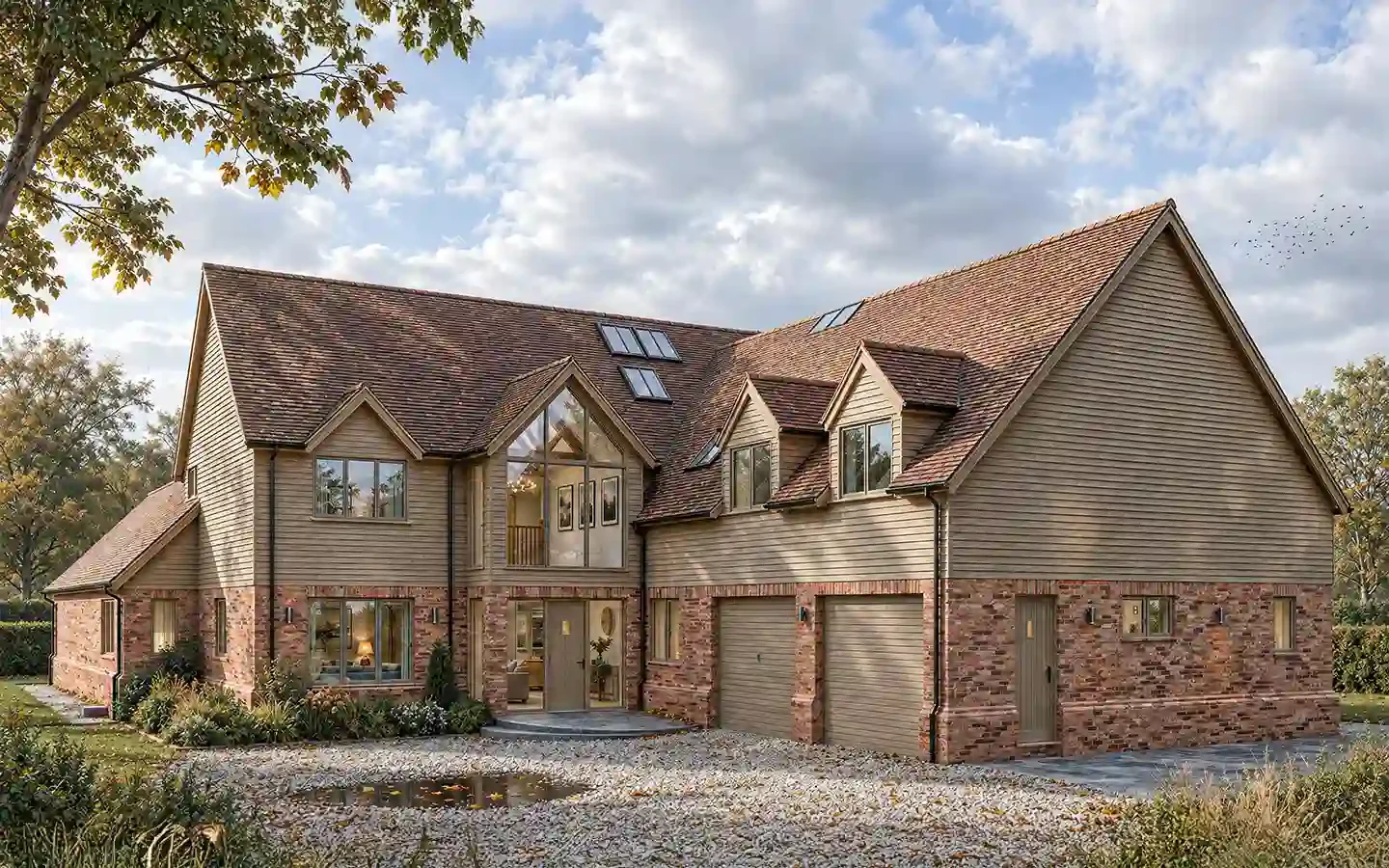 Proposed front view of a replacement family home in Stratford-upon-Avon, with brickwork, timber cladding, a glazed entrance gable and double garage.