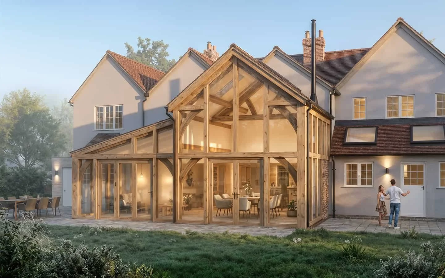 Oak-framed rear extension in Warwickshire with double-height glazing and single-storey link for open-plan living
