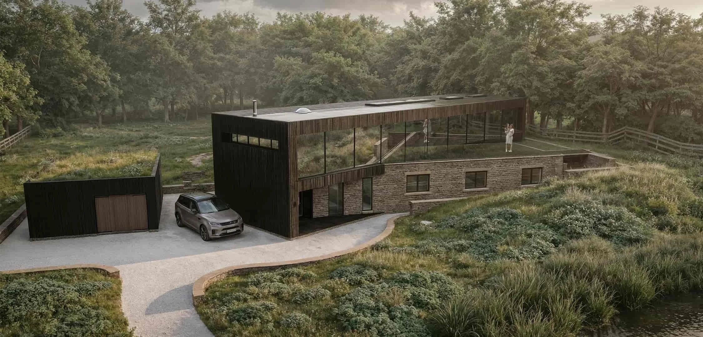 Contemporary eco-home near Alcester with timber cladding, green roof and full-height glazing, blending modern living with countryside views.