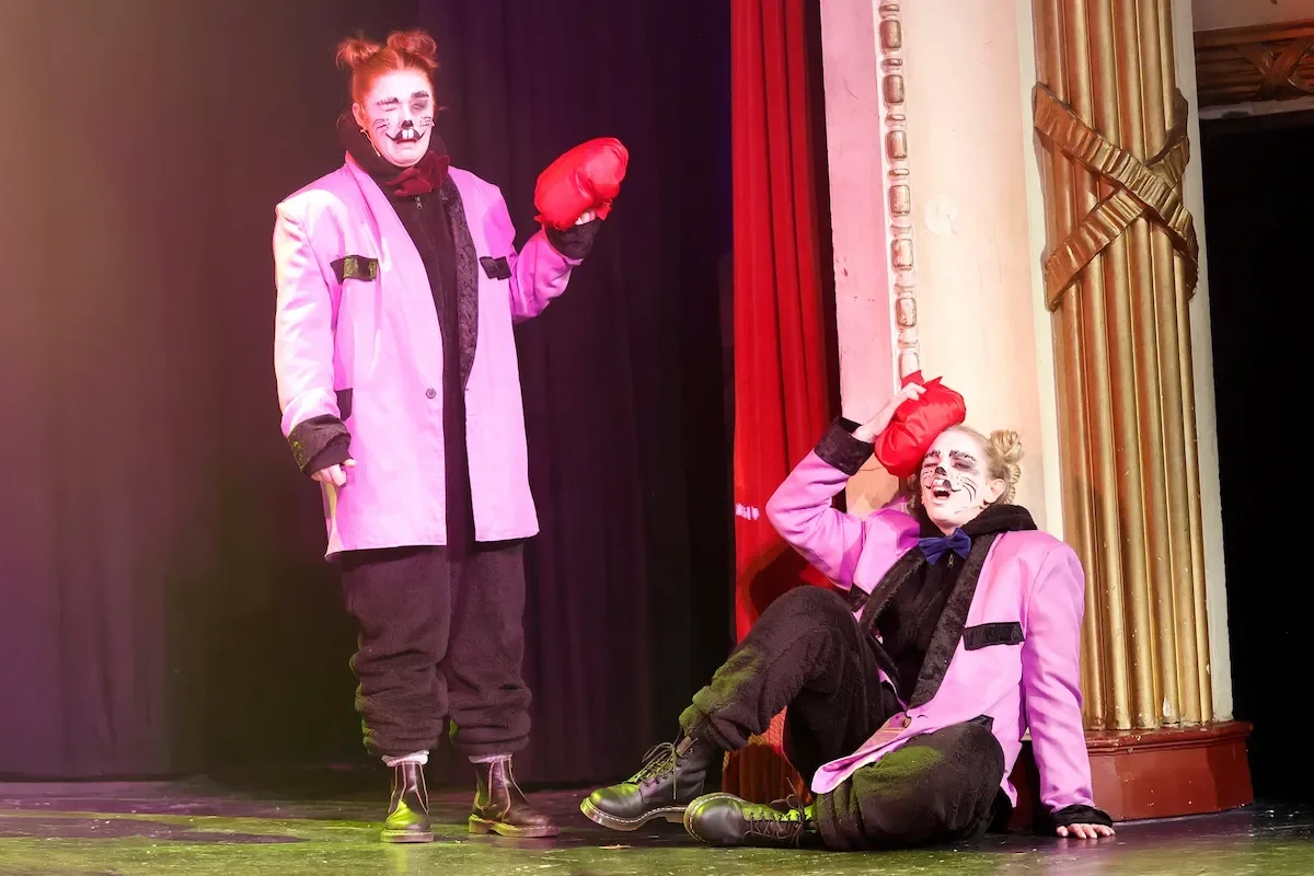 Performers in a productuin of Dick Whittington