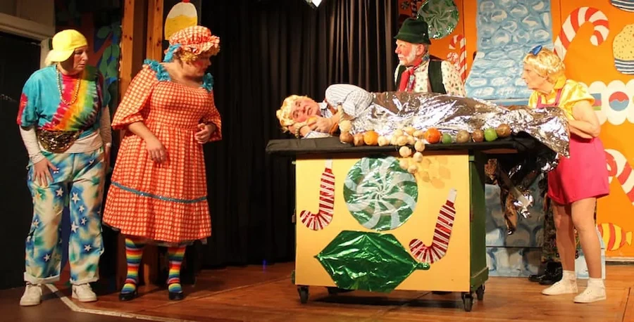 Panto production photo of a scene in the Gingerbread House in Hansel and Gretel