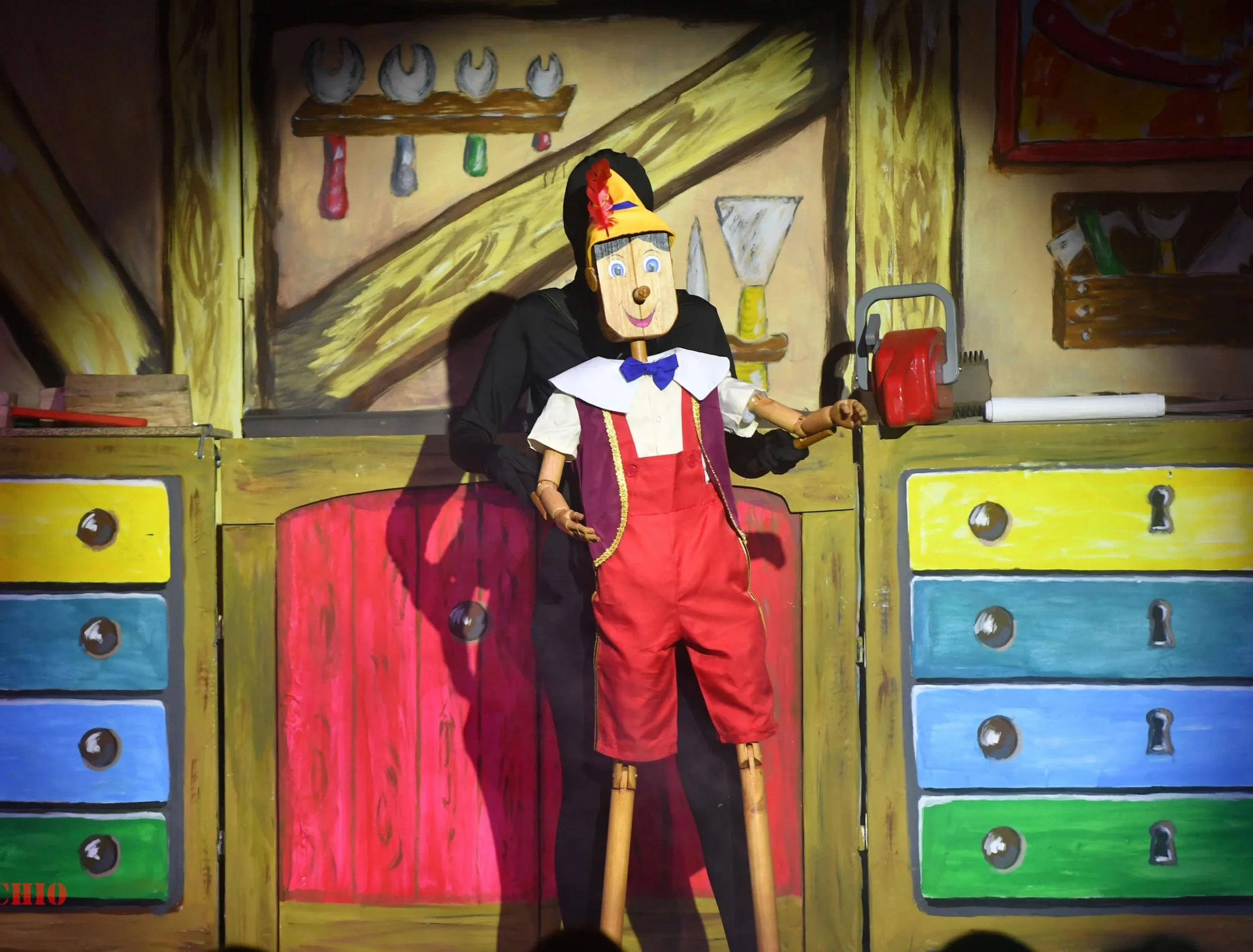 An actor in a Pinocchio pantomime script production photo