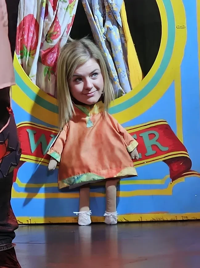 Performer as Aladdin in a production of Aladdin pantomime script