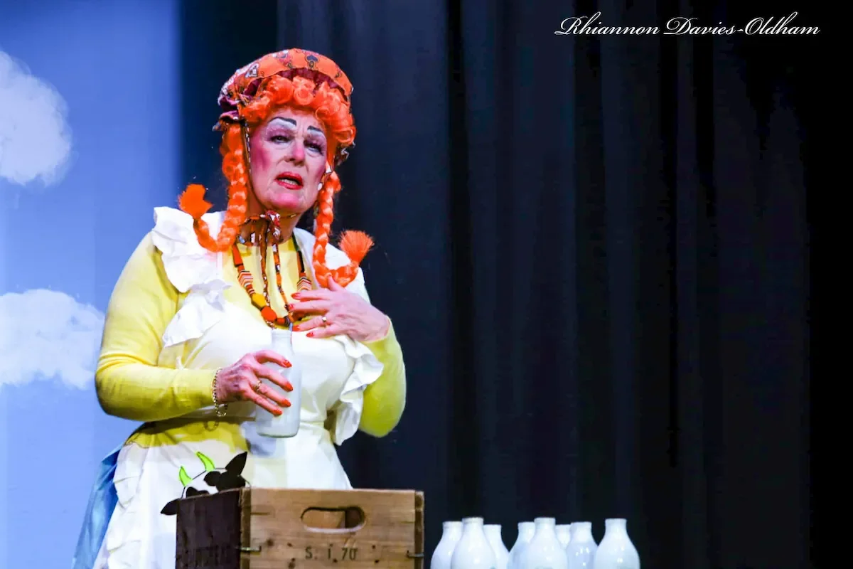 Dame Trott preparing milk bottles for the milk round