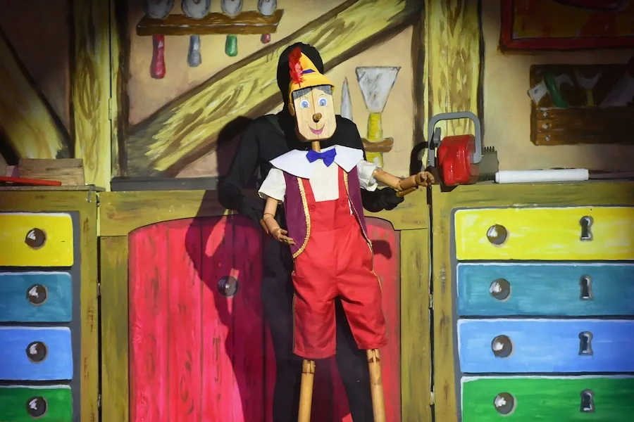 The puppet-boy Pinocchio in a pantomime production photo