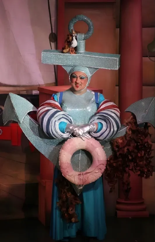 Performer as Dame Smee in a production of Peter Pan pantomime script