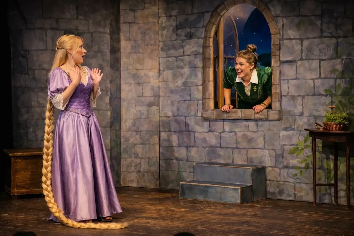 Prince Leo climbing through the window of Rapunzel's tower