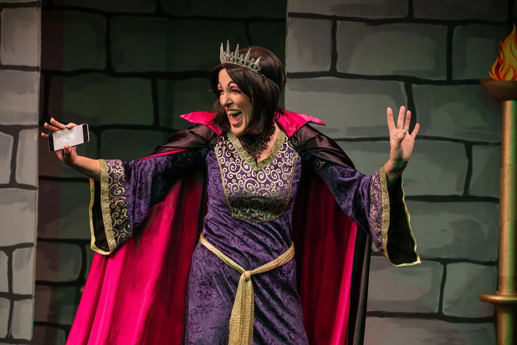 Wicked Queen Devilia in a pantomime production of Snow White