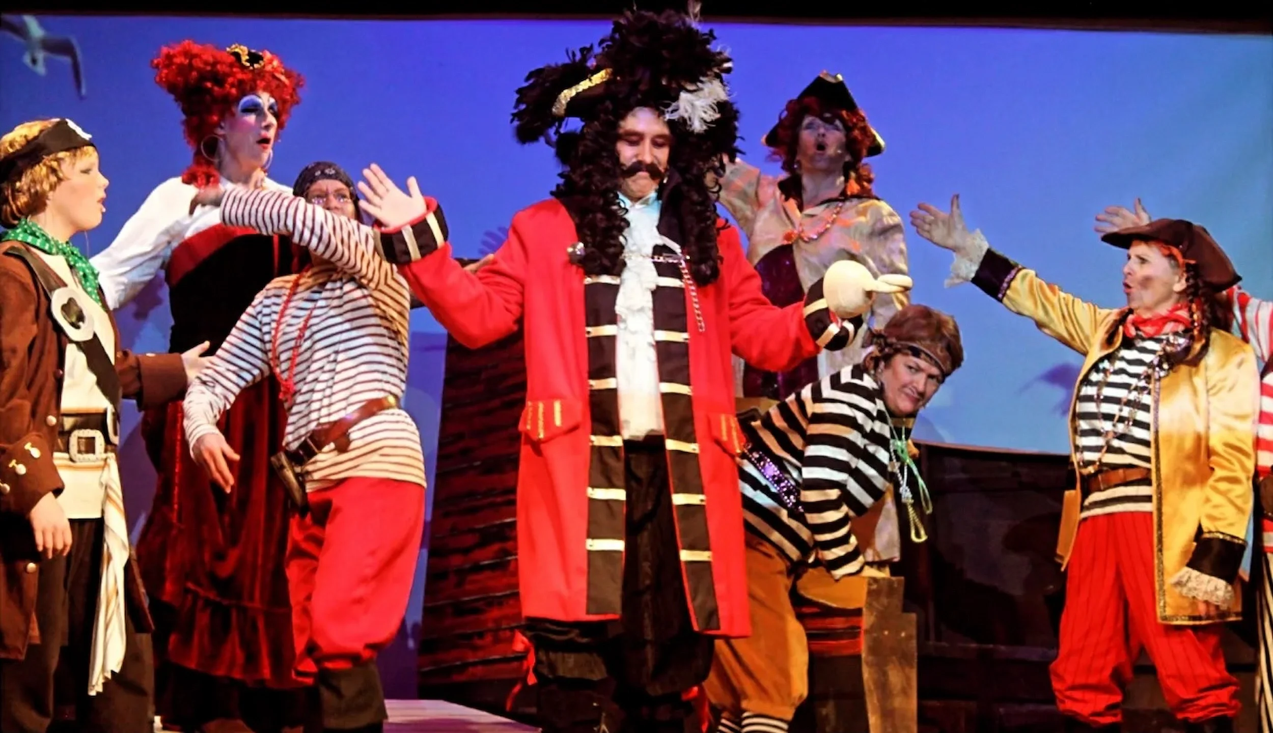 Peter Pan pantomime script production image featuring Captain Hook and the pirates